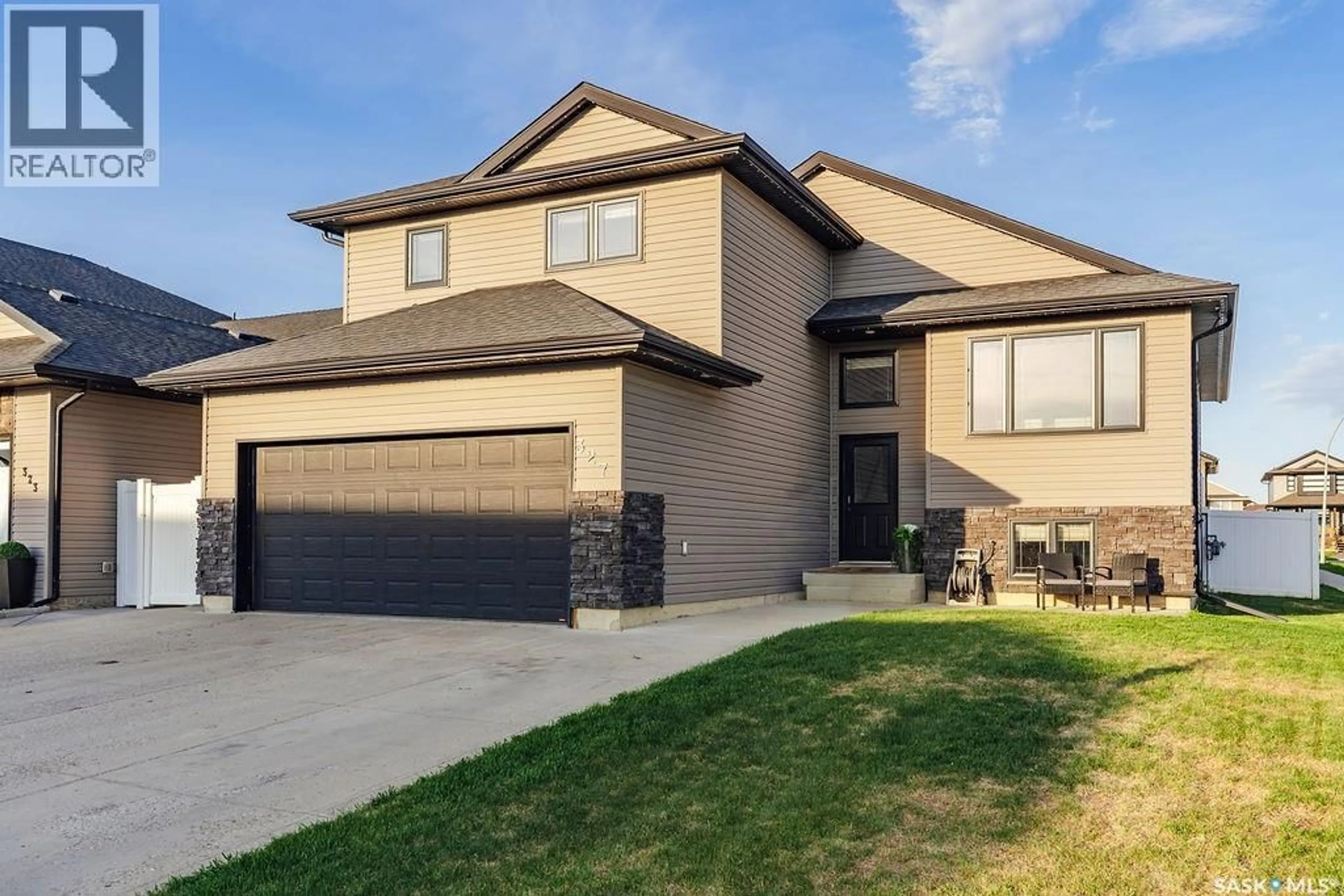 Home with brick exterior material, street for 327 ROY CRESCENT, Saskatoon Saskatchewan S7W0L1