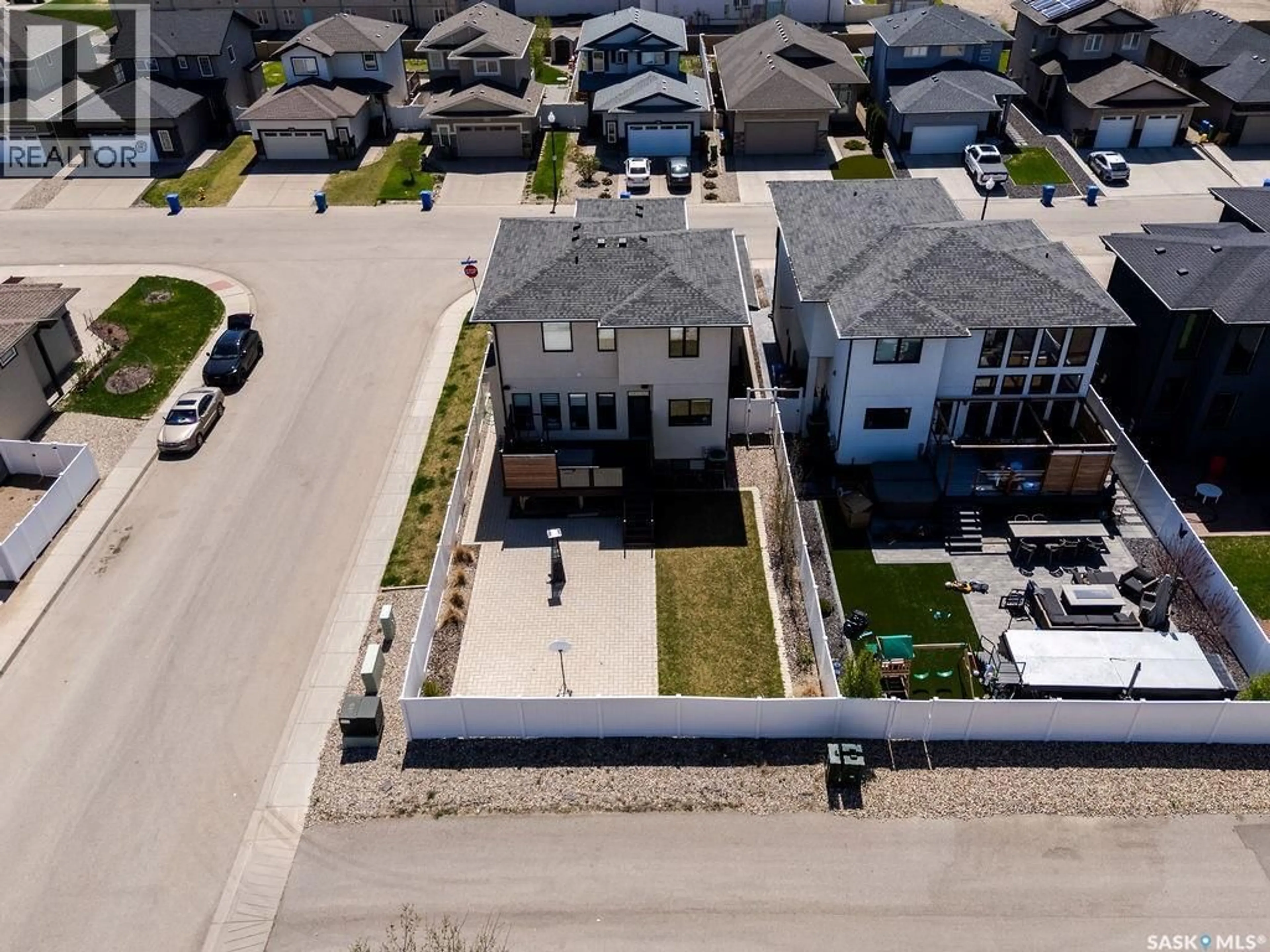 A pic from outside/outdoor area/front of a property/back of a property/a pic from drone, street for E - 4238 GREEN OLIVE WAY, Regina Saskatchewan S4V1P9