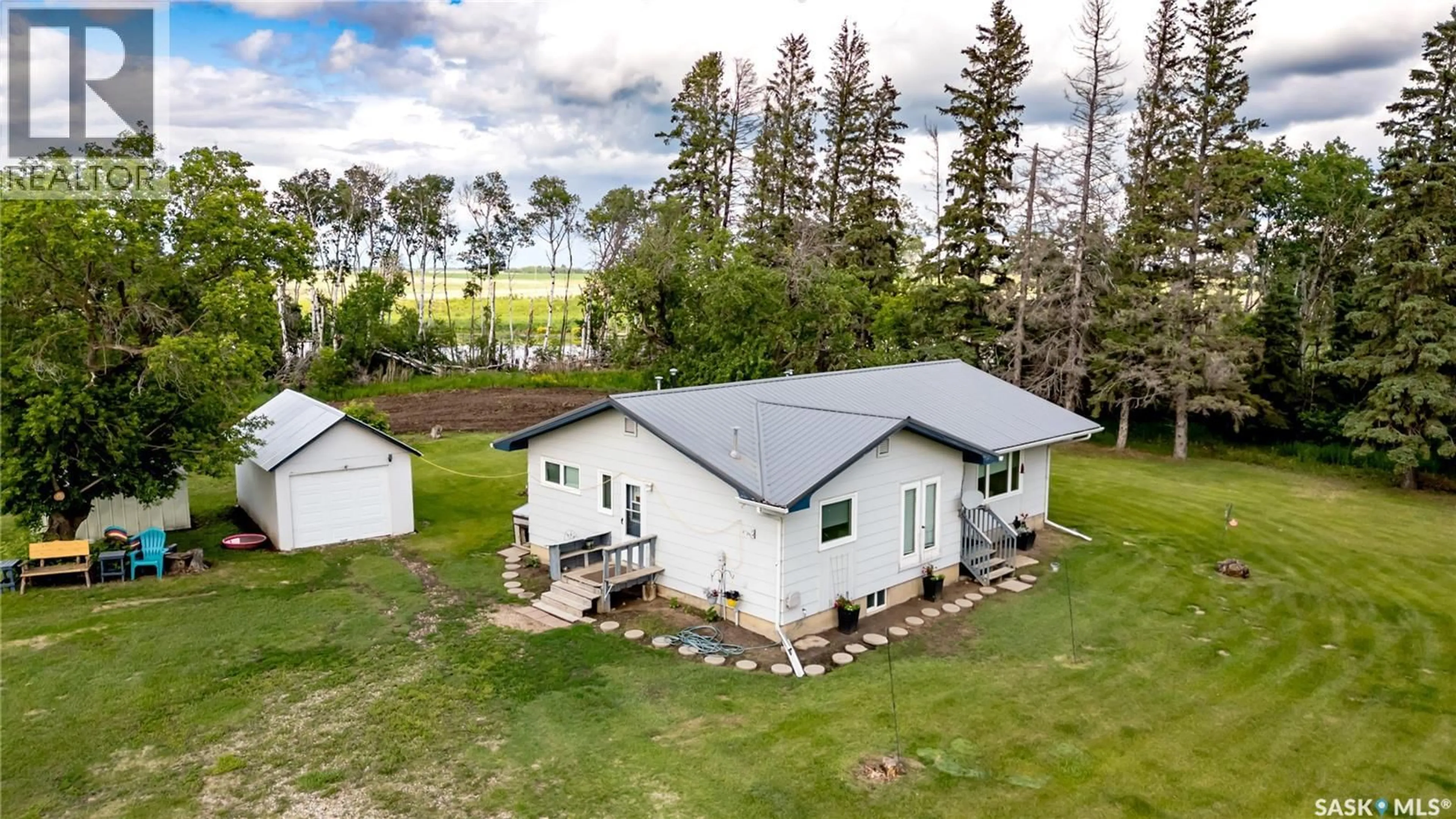 A pic from outside/outdoor area/front of a property/back of a property/a pic from drone, building for ACRES CT, Willow Creek Rm No. 458 Saskatchewan S0E0W0