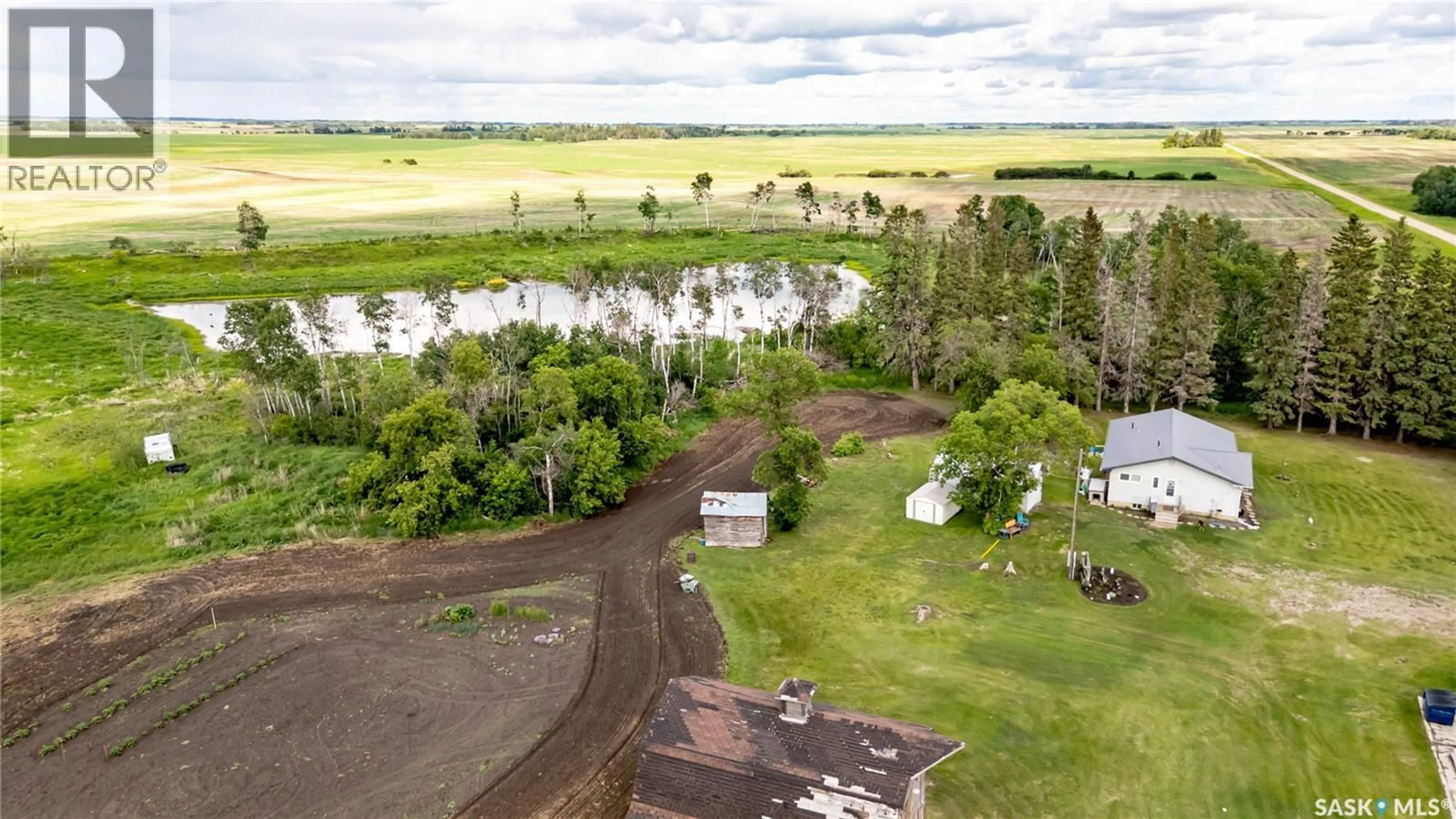A pic from outside/outdoor area/front of a property/back of a property/a pic from drone, water/lake/river/ocean view for ACRES CT, Willow Creek Rm No. 458 Saskatchewan S0E0W0