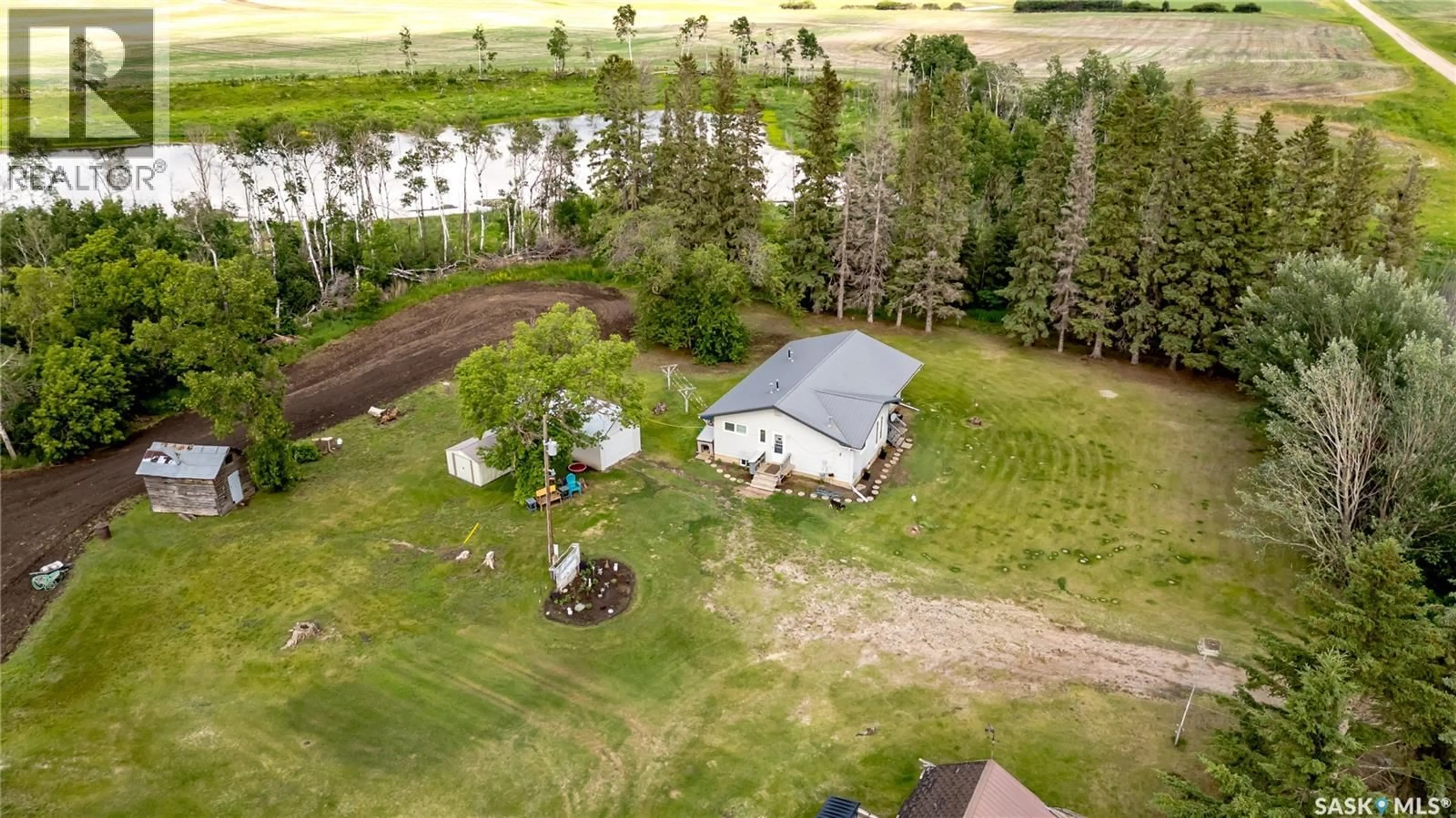 A pic from outside/outdoor area/front of a property/back of a property/a pic from drone, water/lake/river/ocean view for ACRES CT, Willow Creek Rm No. 458 Saskatchewan S0E0W0