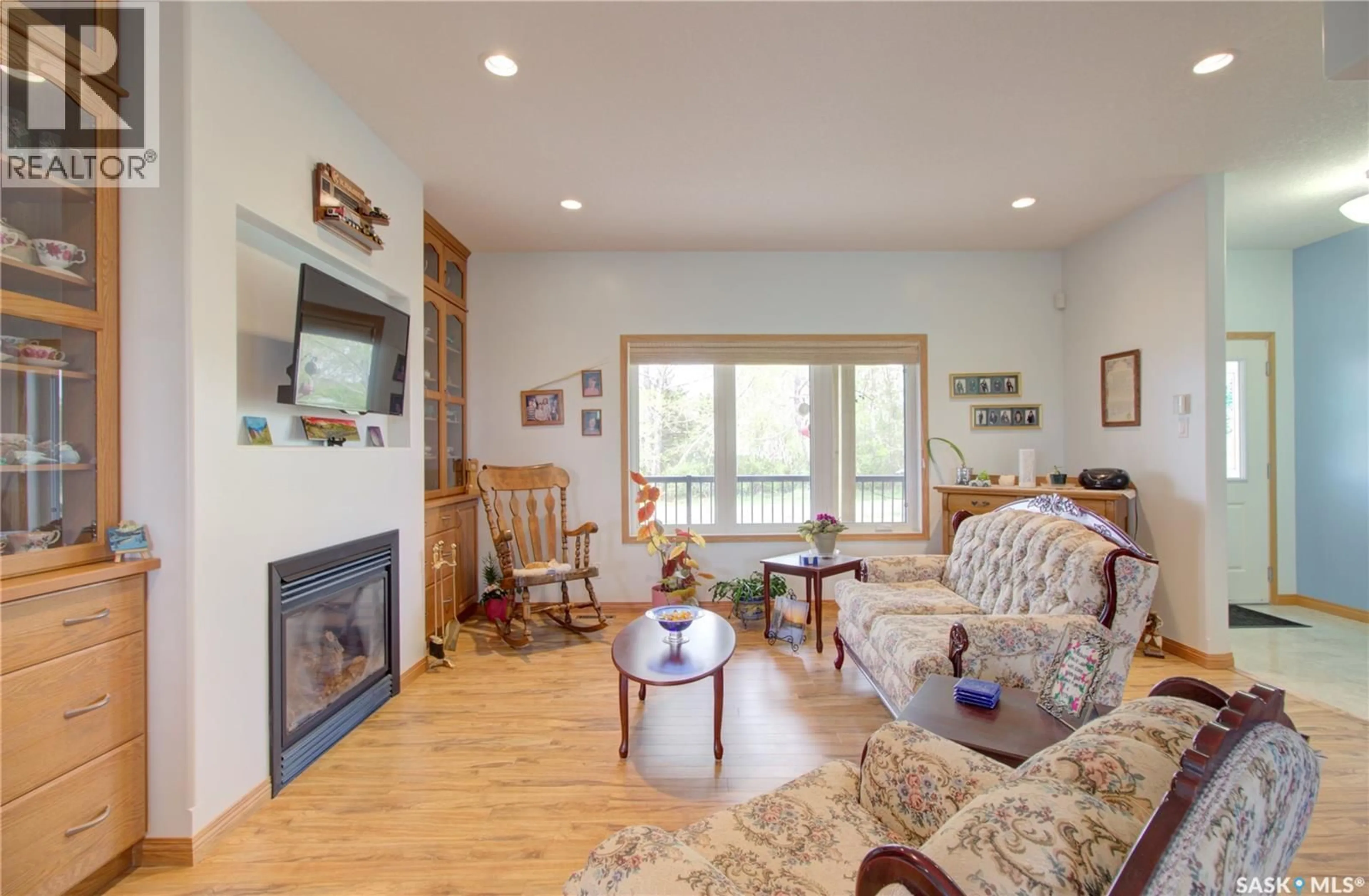 Living room with furniture, wood/laminate floor for 91 1ST STREET, Coteau Rm No. 255 Saskatchewan S0L0G0