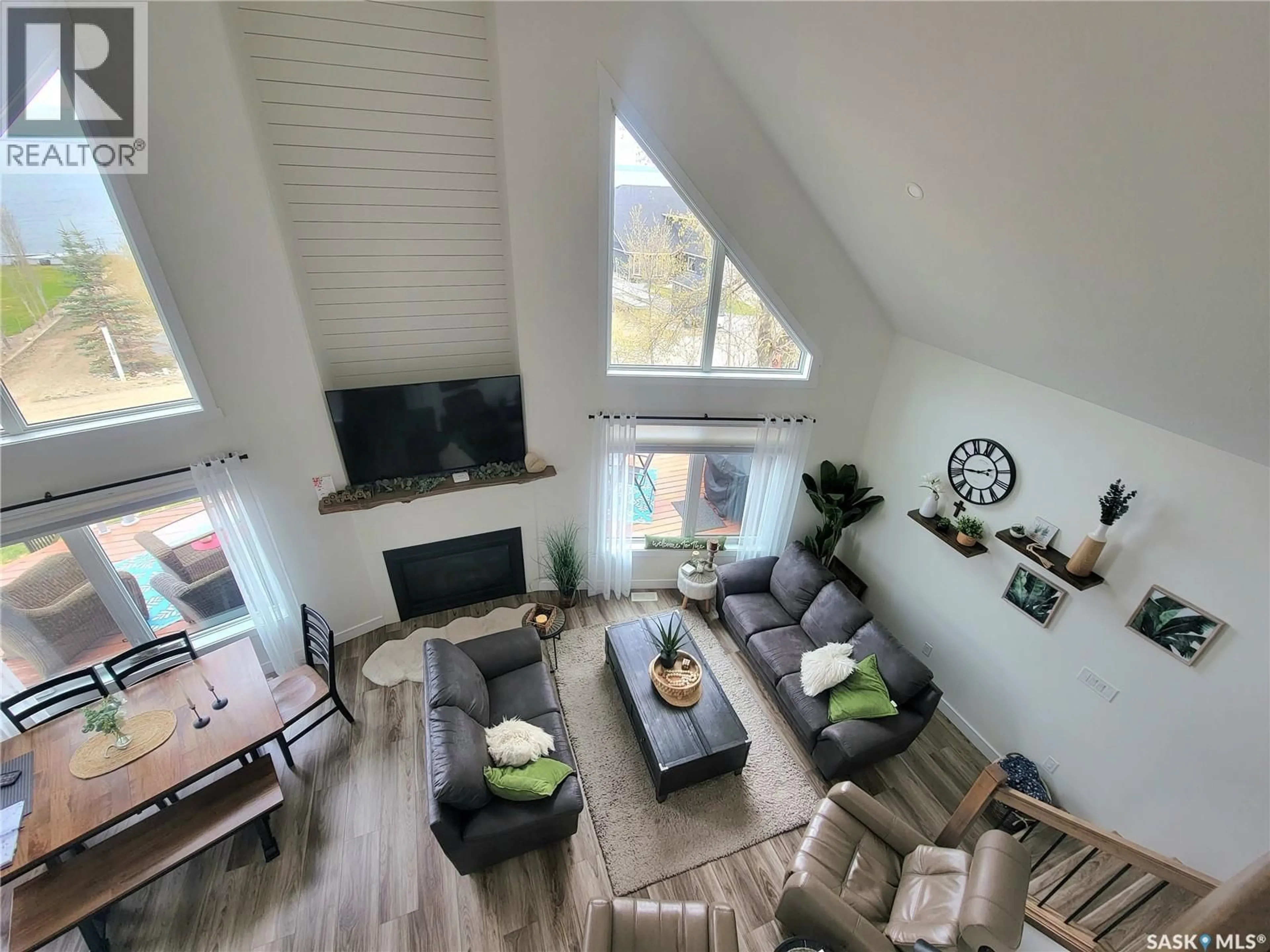 Living room with furniture, wood/laminate floor for 390 2ND AVENUE, Meota Saskatchewan S0M1X0