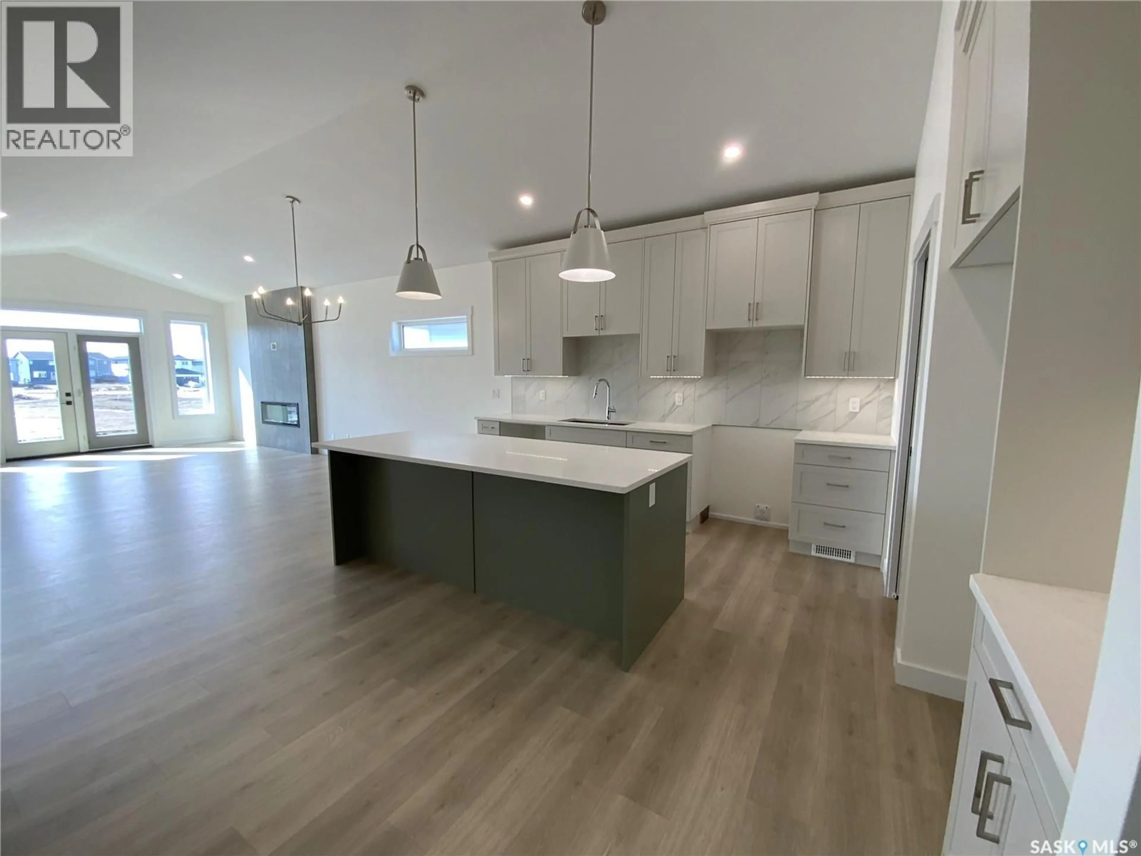 Open concept kitchen, unknown for 242 DORAN WAY, Saskatoon Saskatchewan S7H4N2