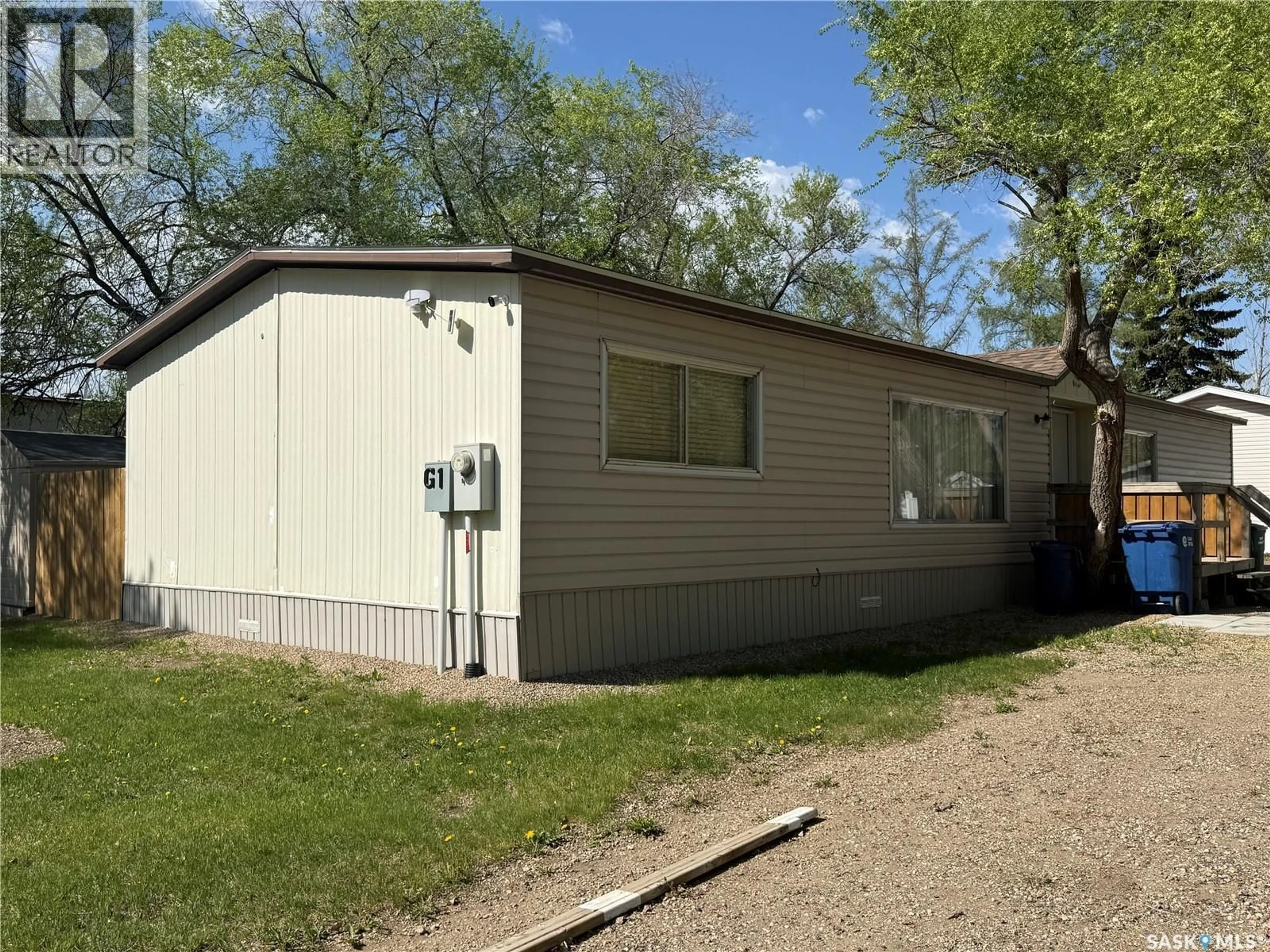Home with vinyl exterior material, street for G1 - 1455 9TH AVENUE, Moose Jaw Saskatchewan S6J1C6