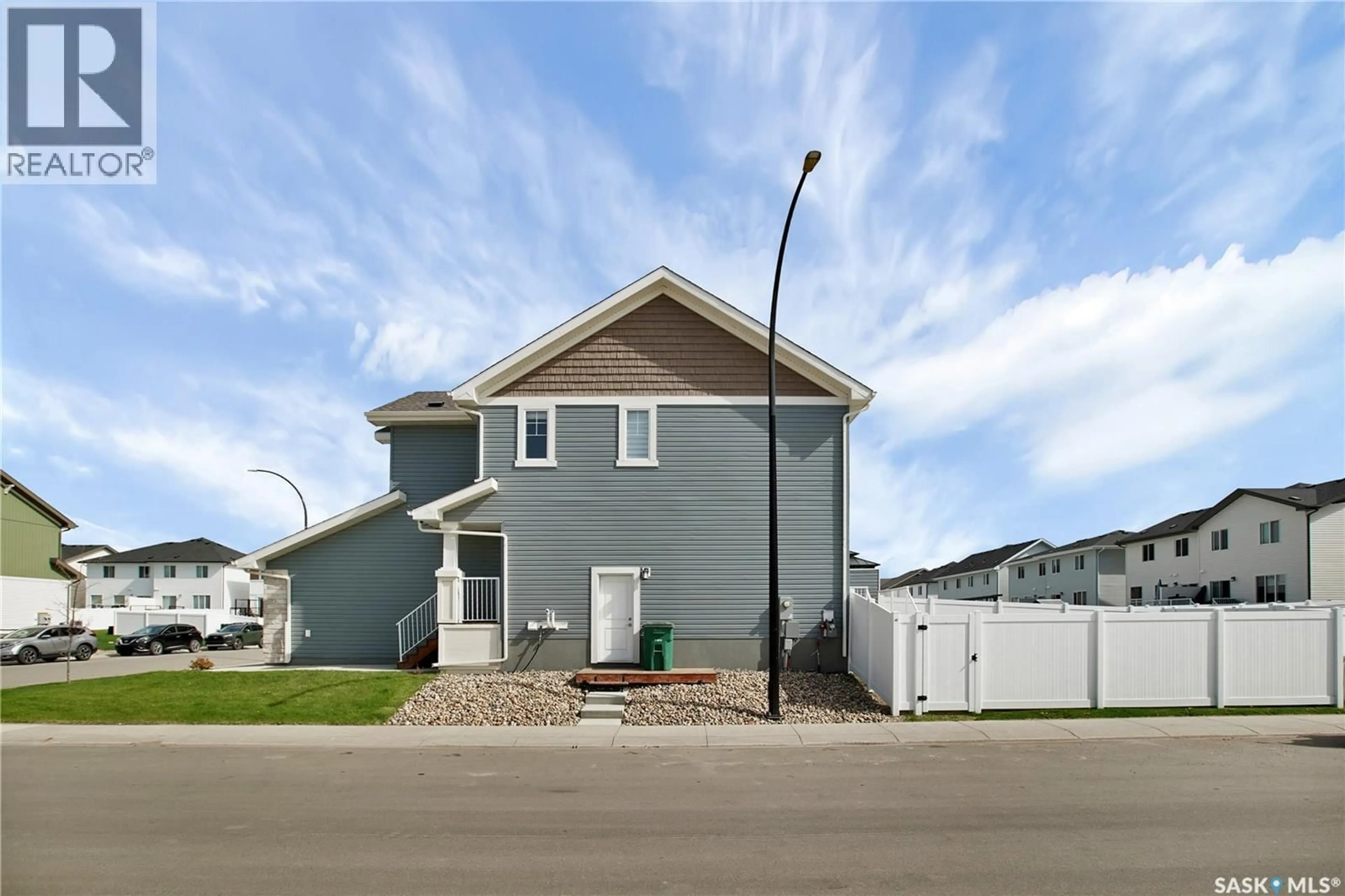 Home with vinyl exterior material, street for 503 SCHMEISER AVENUE, Saskatoon Saskatchewan S7V1P2