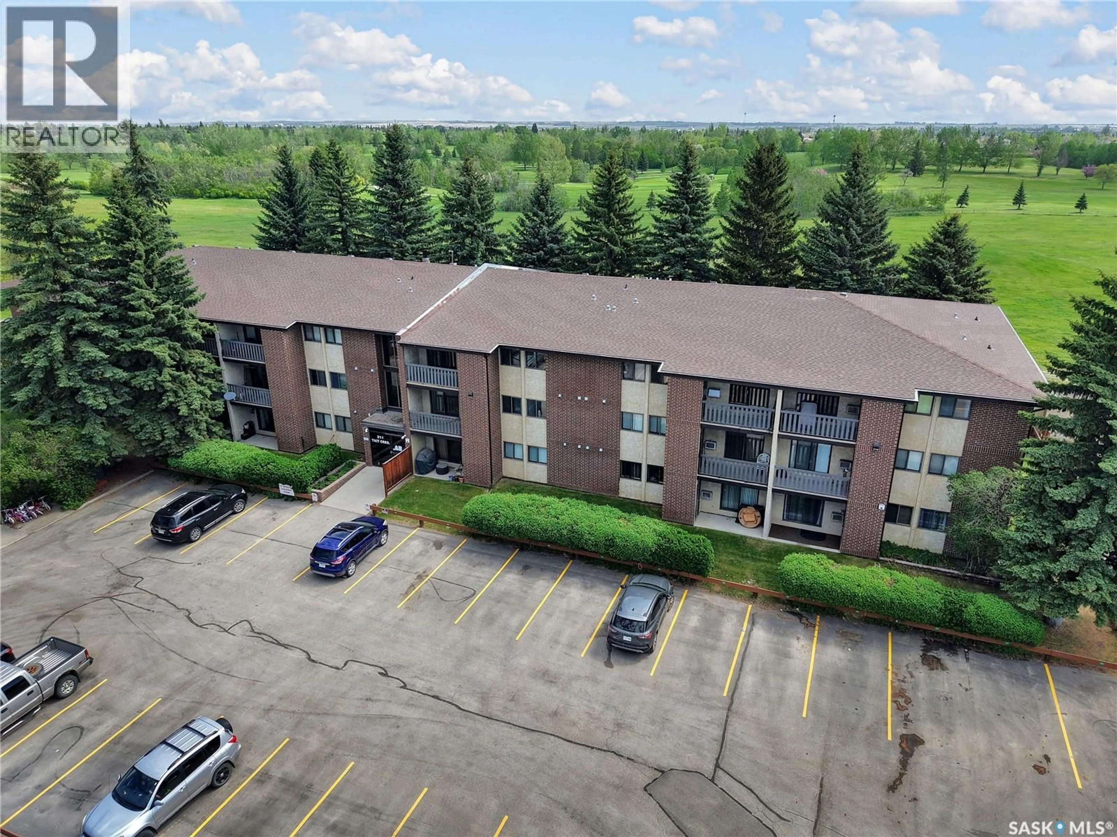 A pic from outside/outdoor area/front of a property/back of a property/a pic from drone, building for 311 - 308 TAIT CRESCENT, Saskatoon Saskatchewan S7H5L7