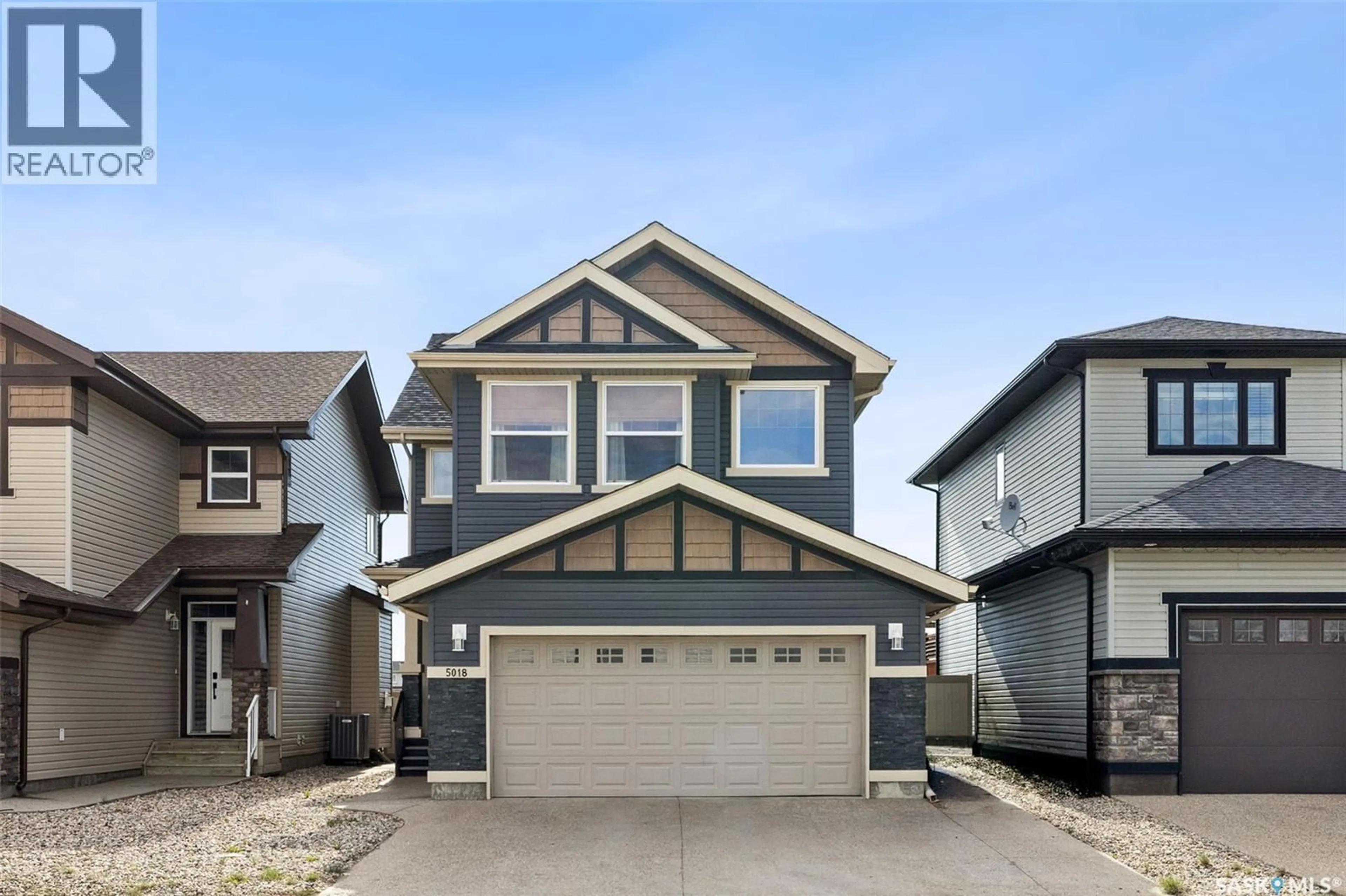 Home with vinyl exterior material, street for 5018 PADWICK ROAD, Regina Saskatchewan S4W0C4