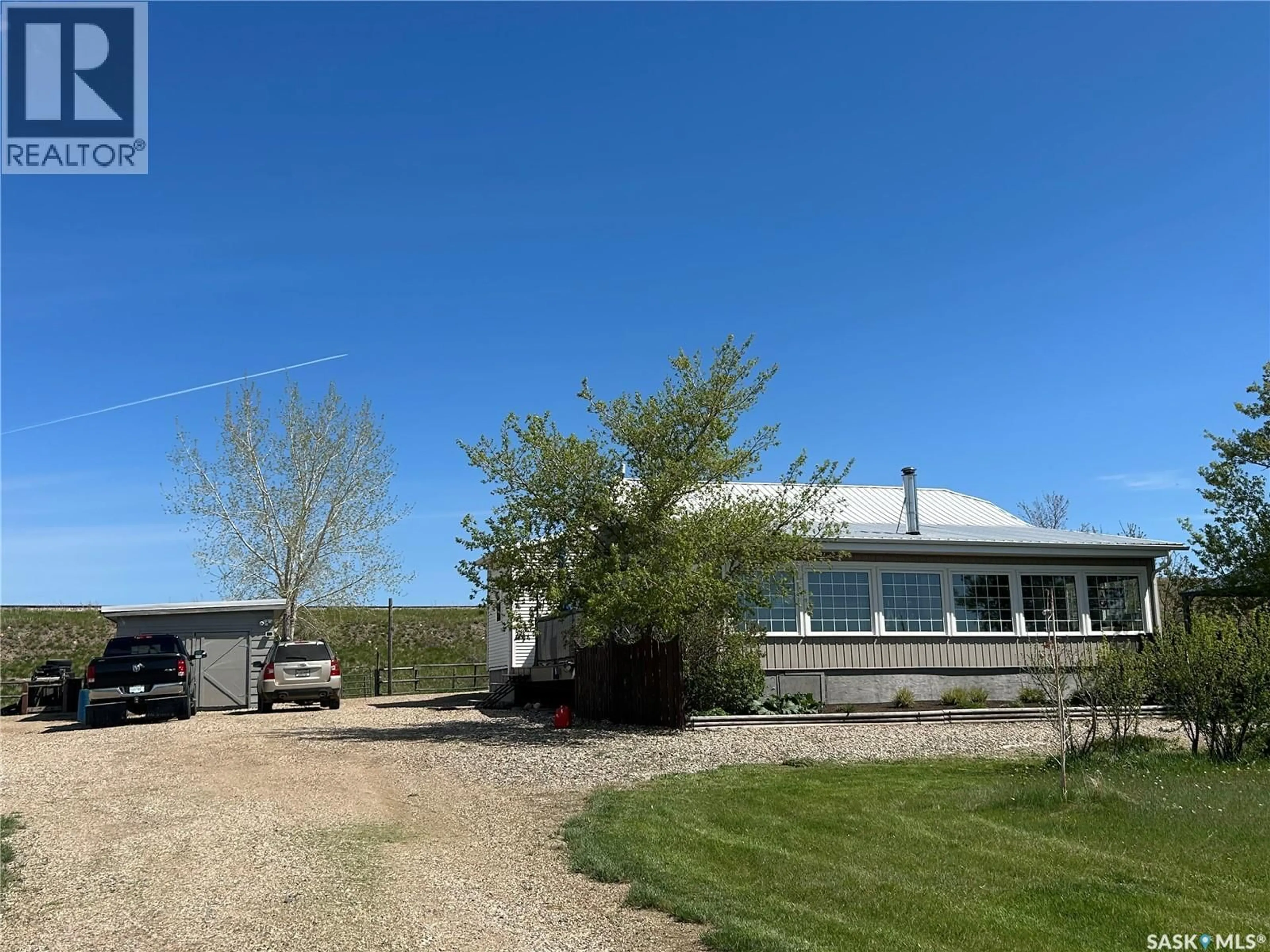 A pic from outside/outdoor area/front of a property/back of a property/a pic from drone, building for 18.6 ESTEVAN ACREAGE, Estevan Saskatchewan S4A2A3