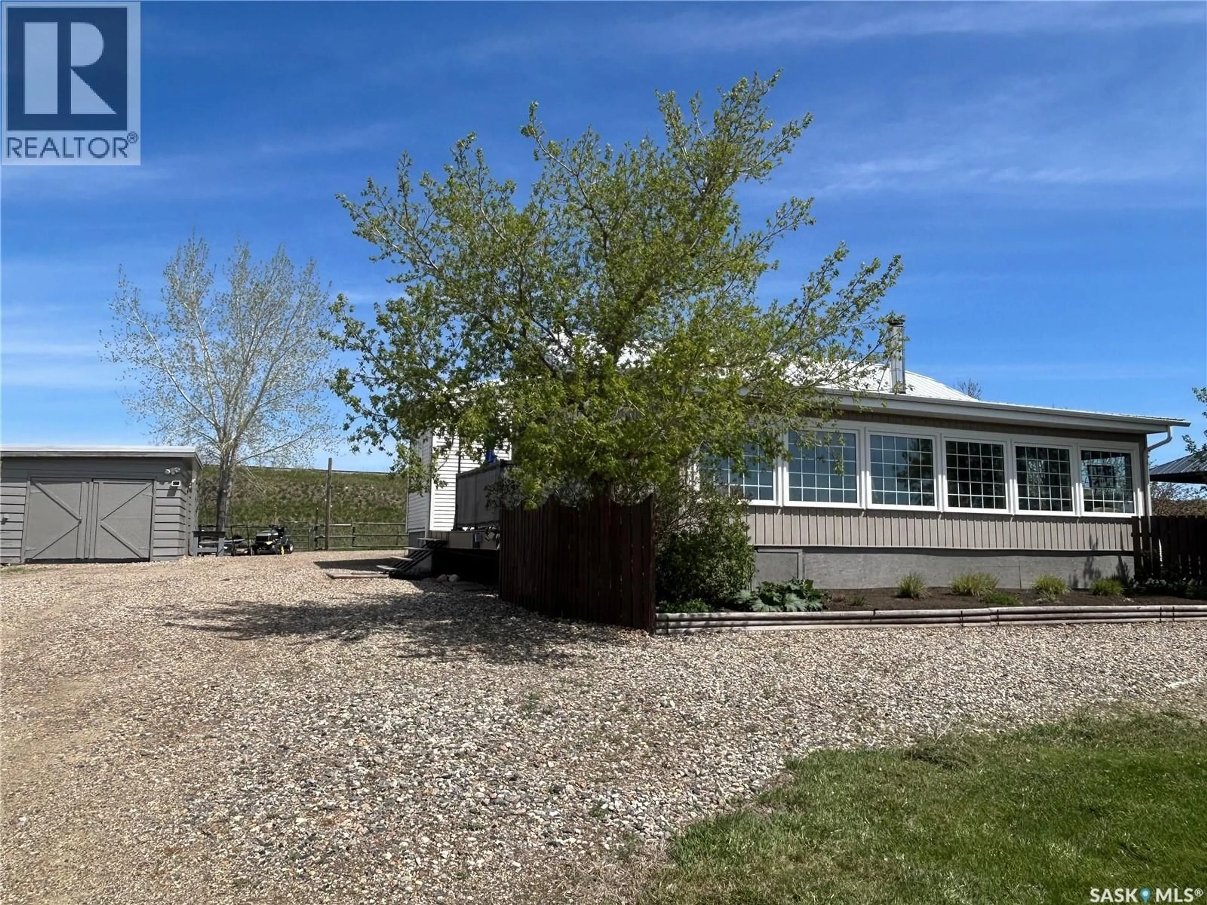 A pic from outside/outdoor area/front of a property/back of a property/a pic from drone, building for 18.6 ESTEVAN ACREAGE, Estevan Saskatchewan S4A2A3