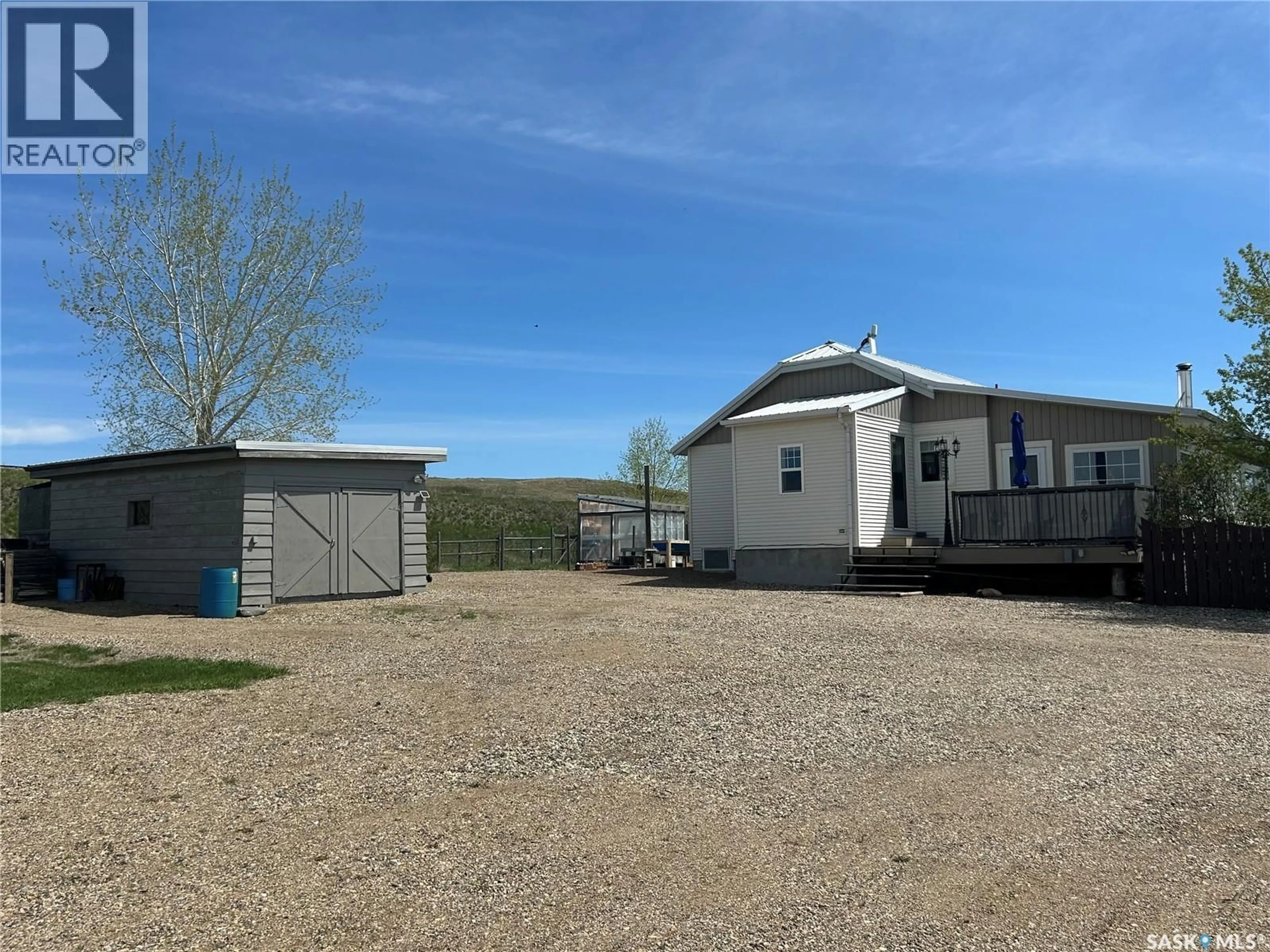 A pic from outside/outdoor area/front of a property/back of a property/a pic from drone, unknown for 18.6 ESTEVAN ACREAGE, Estevan Saskatchewan S4A2A3