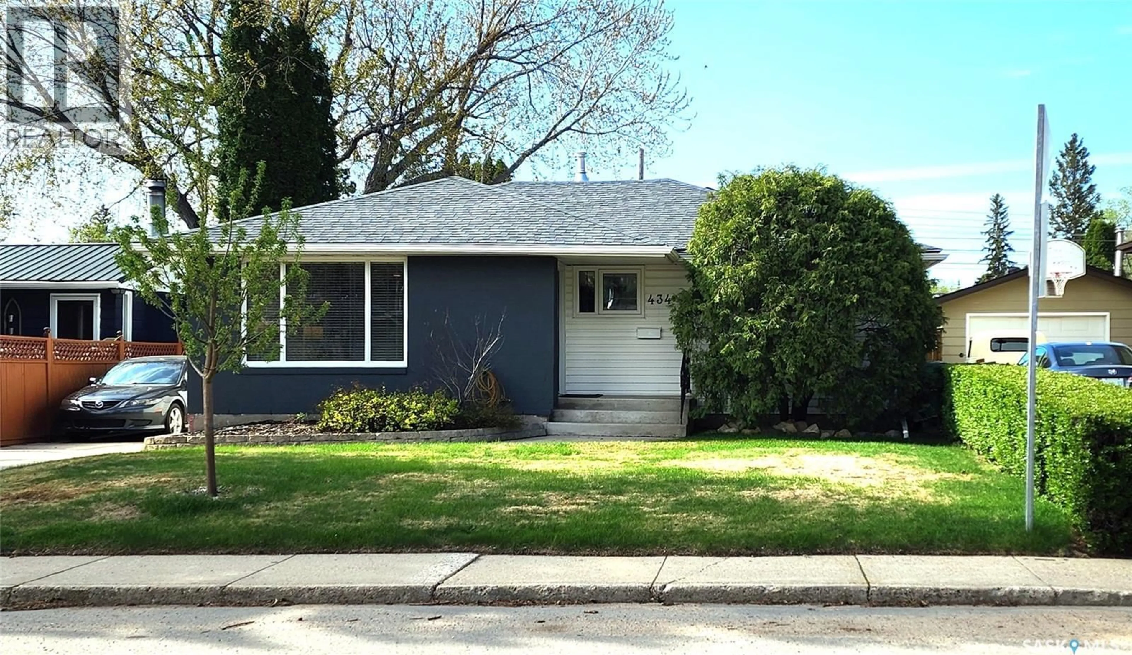 Home with vinyl exterior material, street for 434 ASH STREET, Saskatoon Saskatchewan S7J0K5