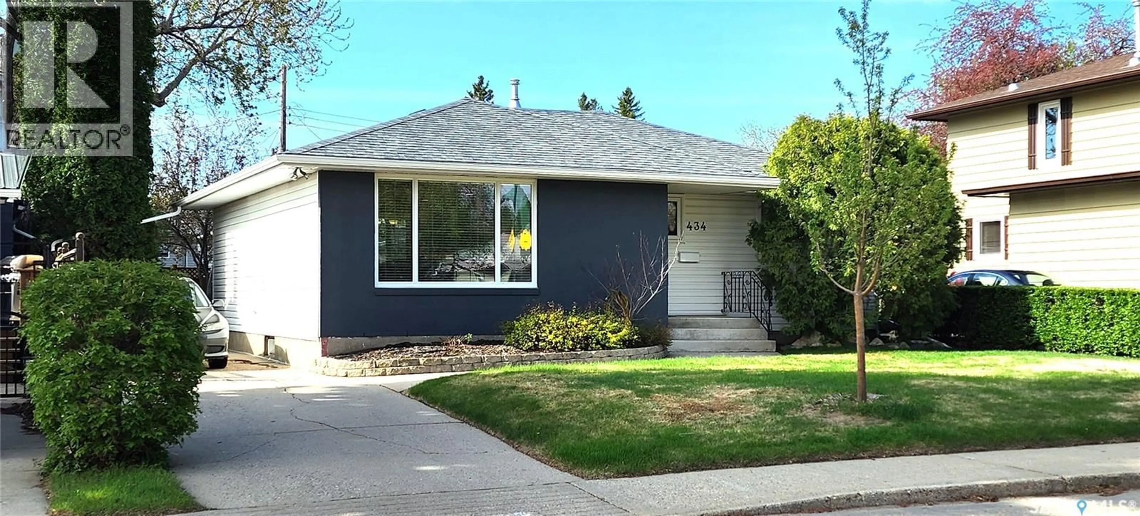 Home with vinyl exterior material, street for 434 ASH STREET, Saskatoon Saskatchewan S7J0K5
