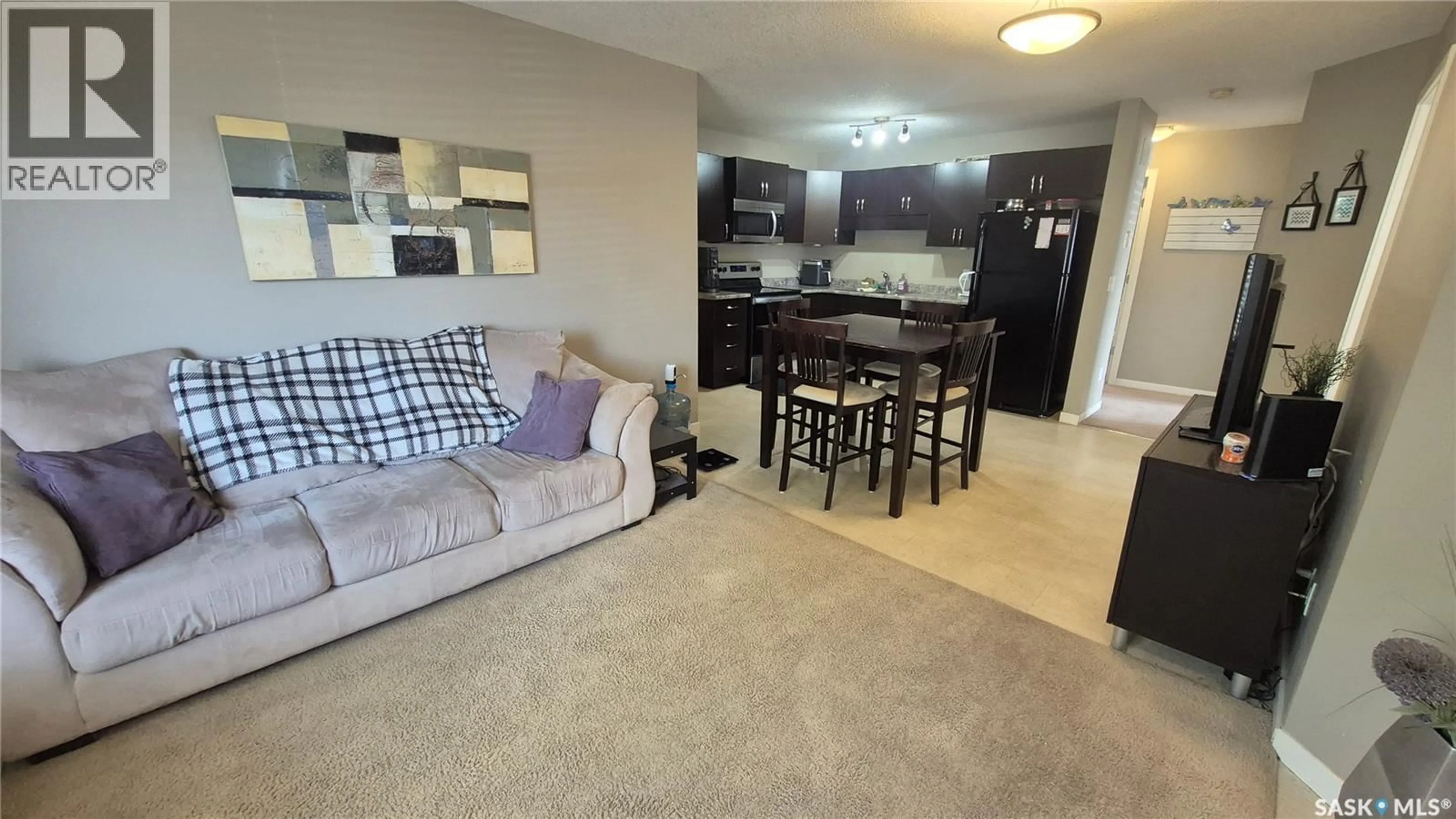 Living room with furniture, unknown for 5027 JAMES HILL ROAD, Regina Saskatchewan S4W0B9