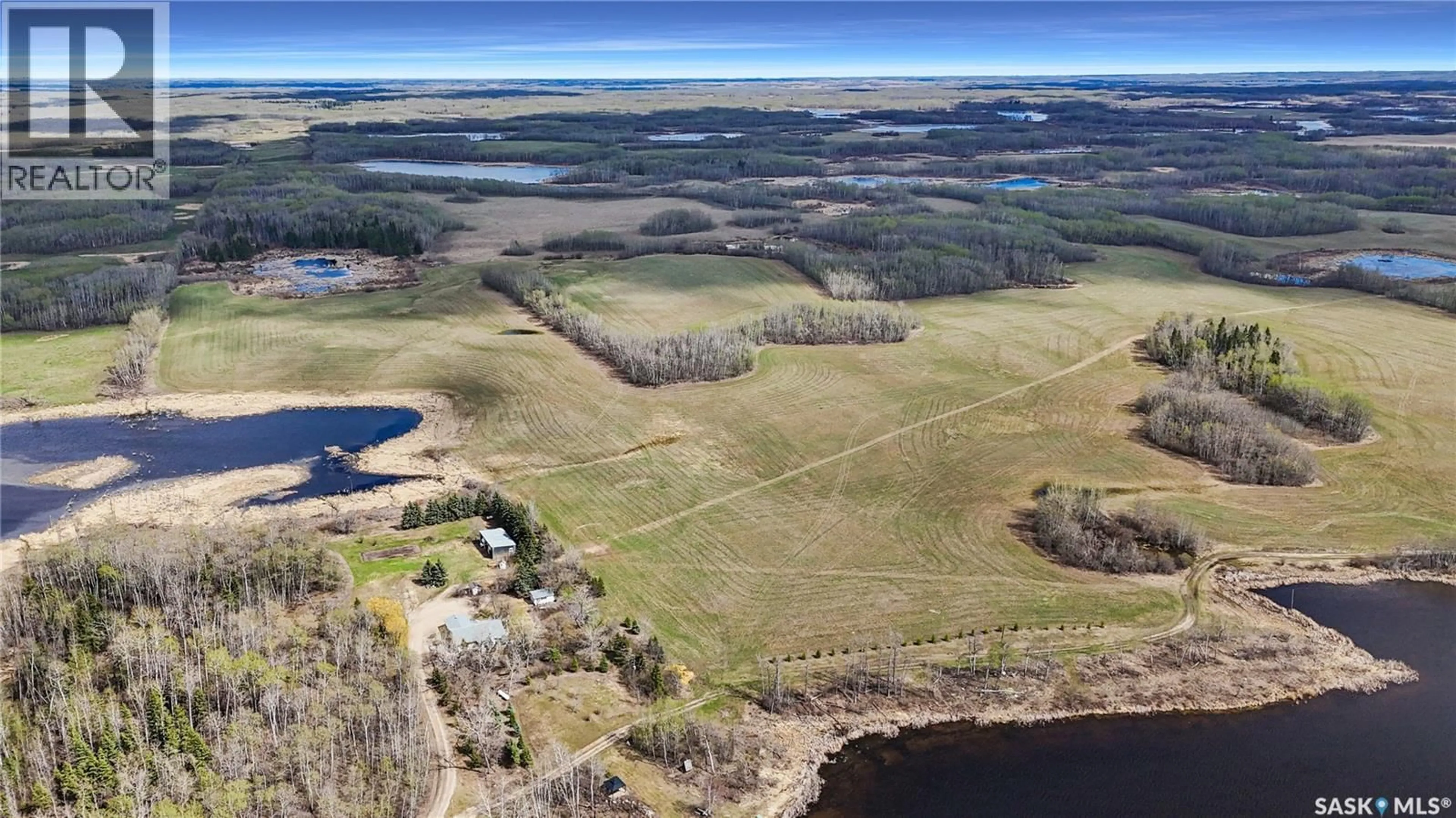 A pic from outside/outdoor area/front of a property/back of a property/a pic from drone, water/lake/river/ocean view for NW - 05 50 09 W3, Spiritwood Rm No. 496 Saskatchewan S0J2M0