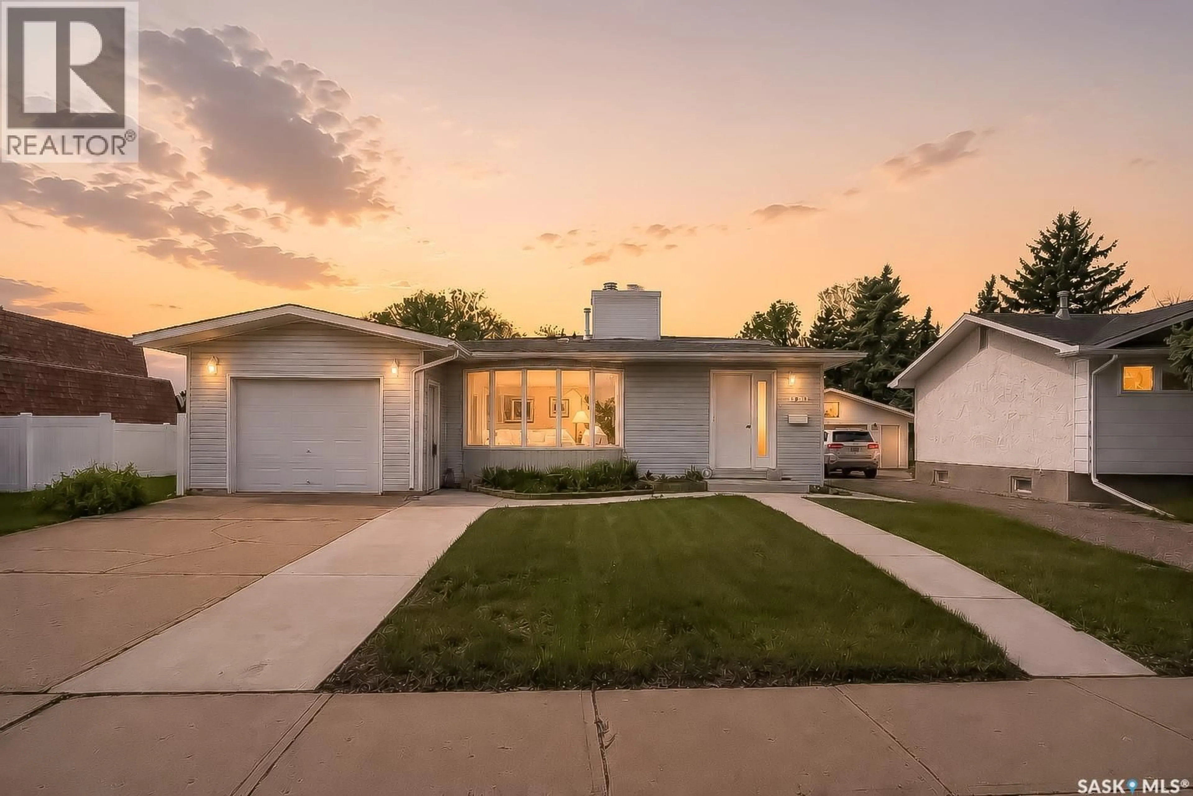 Home with vinyl exterior material, street for 1381 PRINCE CRESCENT, Moose Jaw Saskatchewan S6H6E6
