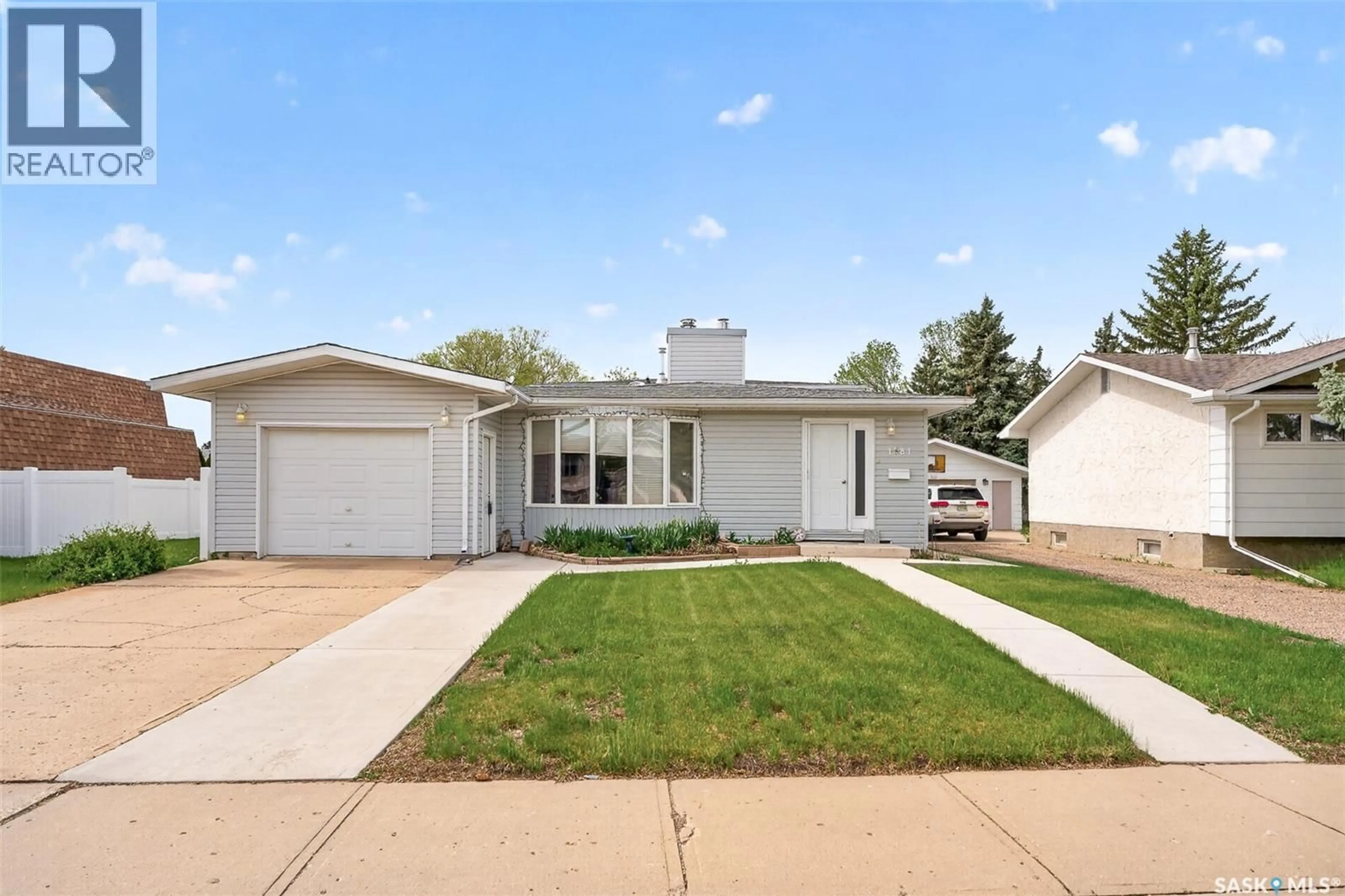 Home with vinyl exterior material, street for 1381 PRINCE CRESCENT, Moose Jaw Saskatchewan S6H6E6