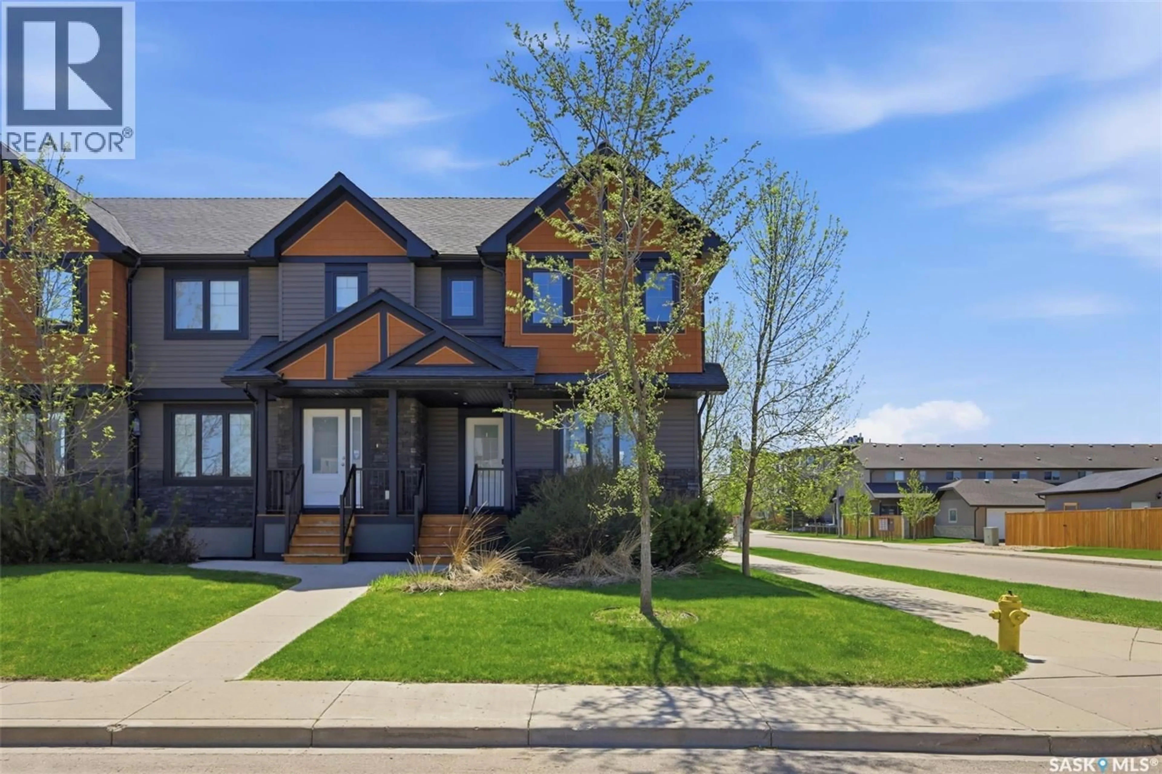 Home with brick exterior material, street for 201 RAJPUT WAY, Saskatoon Saskatchewan S7P0A5