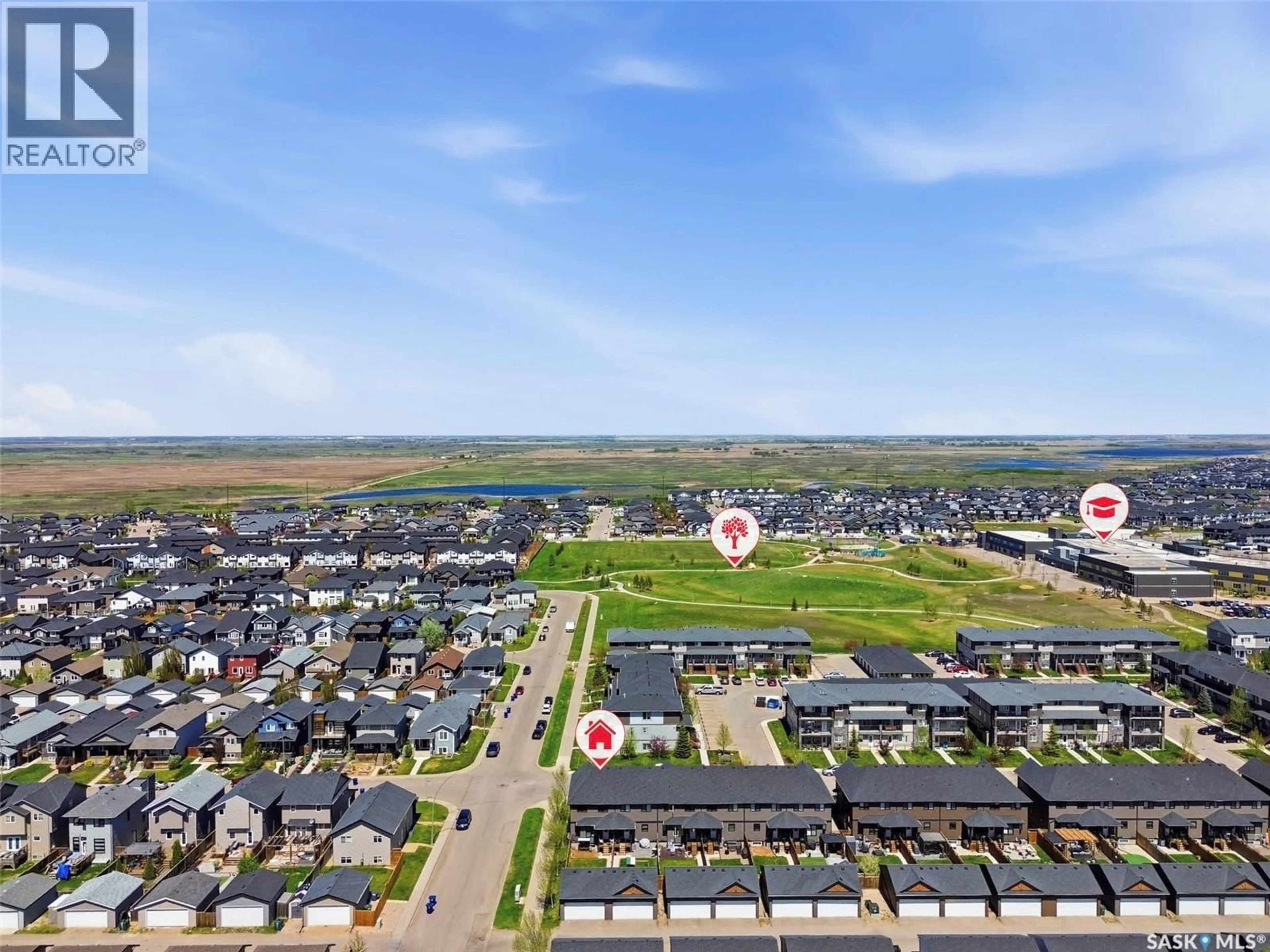 A pic from outside/outdoor area/front of a property/back of a property/a pic from drone, street for 201 RAJPUT WAY, Saskatoon Saskatchewan S7P0A5