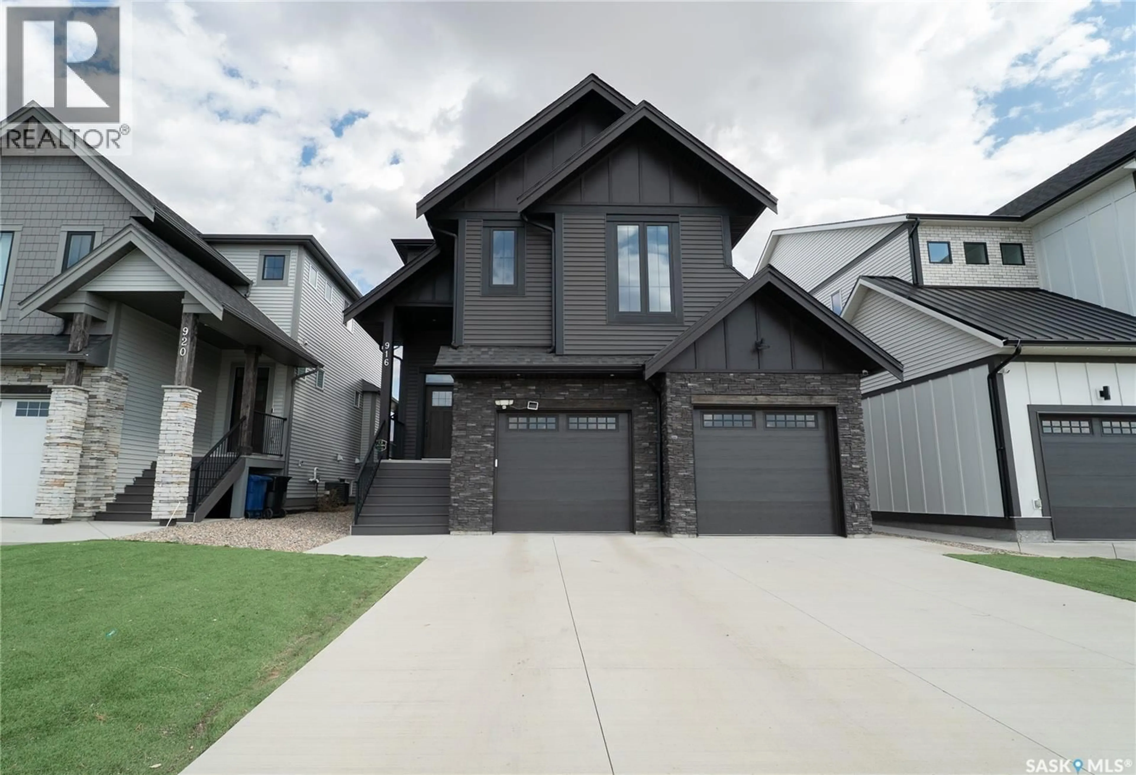 Home with vinyl exterior material, street for 916 FEHEREGYHAZI BOULEVARD, Saskatoon Saskatchewan S7W1E1
