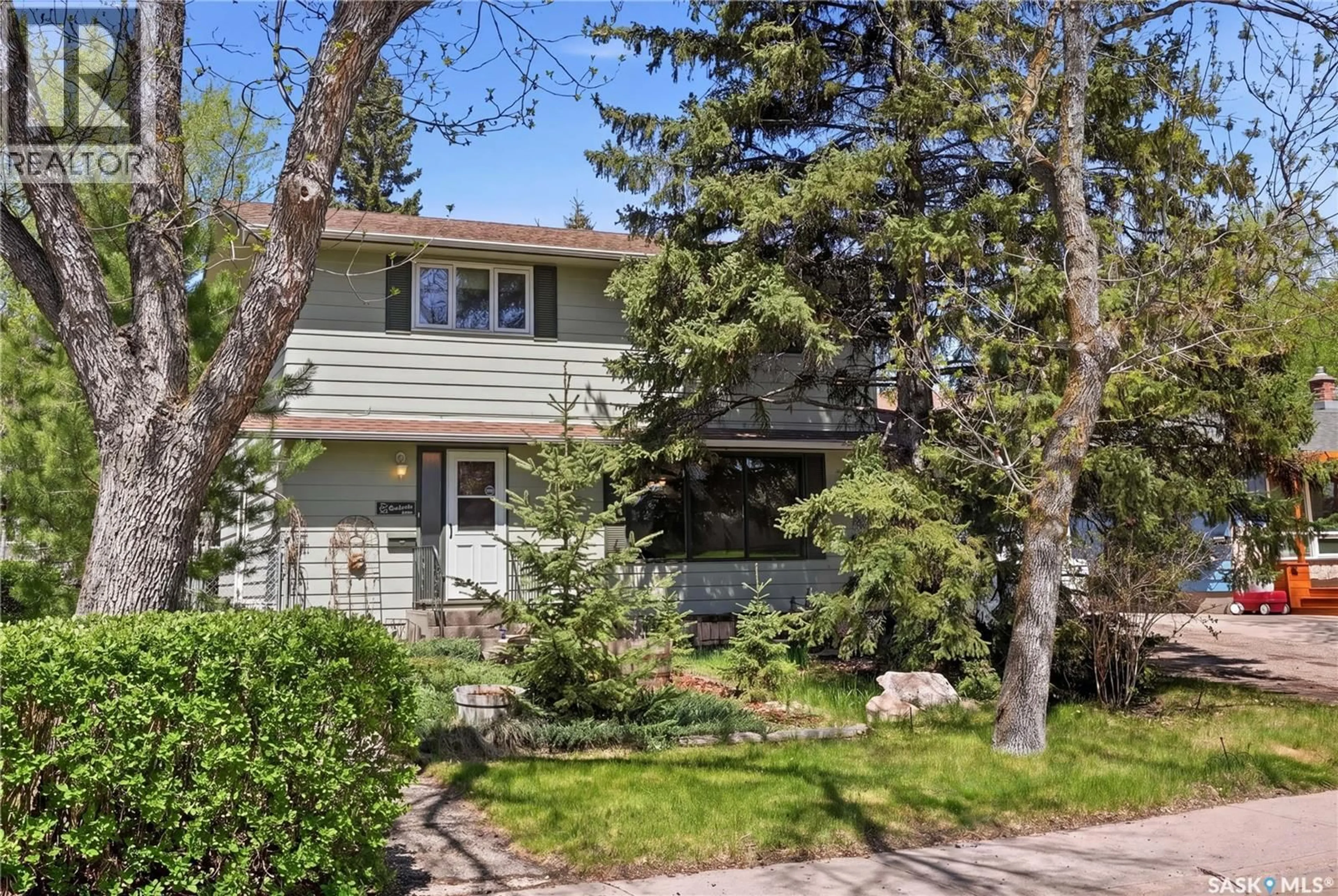 Home with vinyl exterior material, street for 2338 EASTHILL, Saskatoon Saskatchewan S7J3E5
