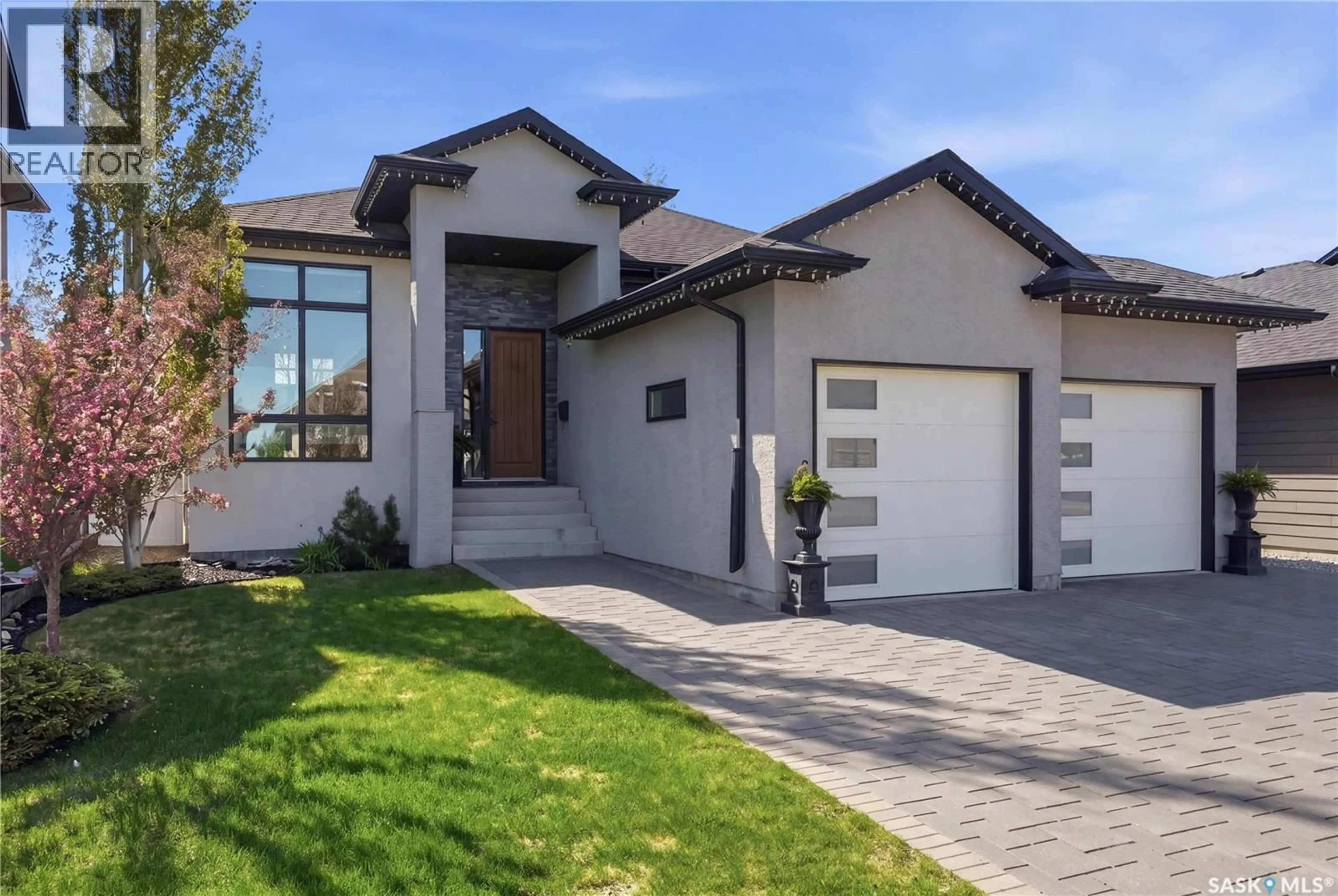 Home with brick exterior material, street for 235 AUGUSTA DRIVE, Warman Saskatchewan S0K4S1