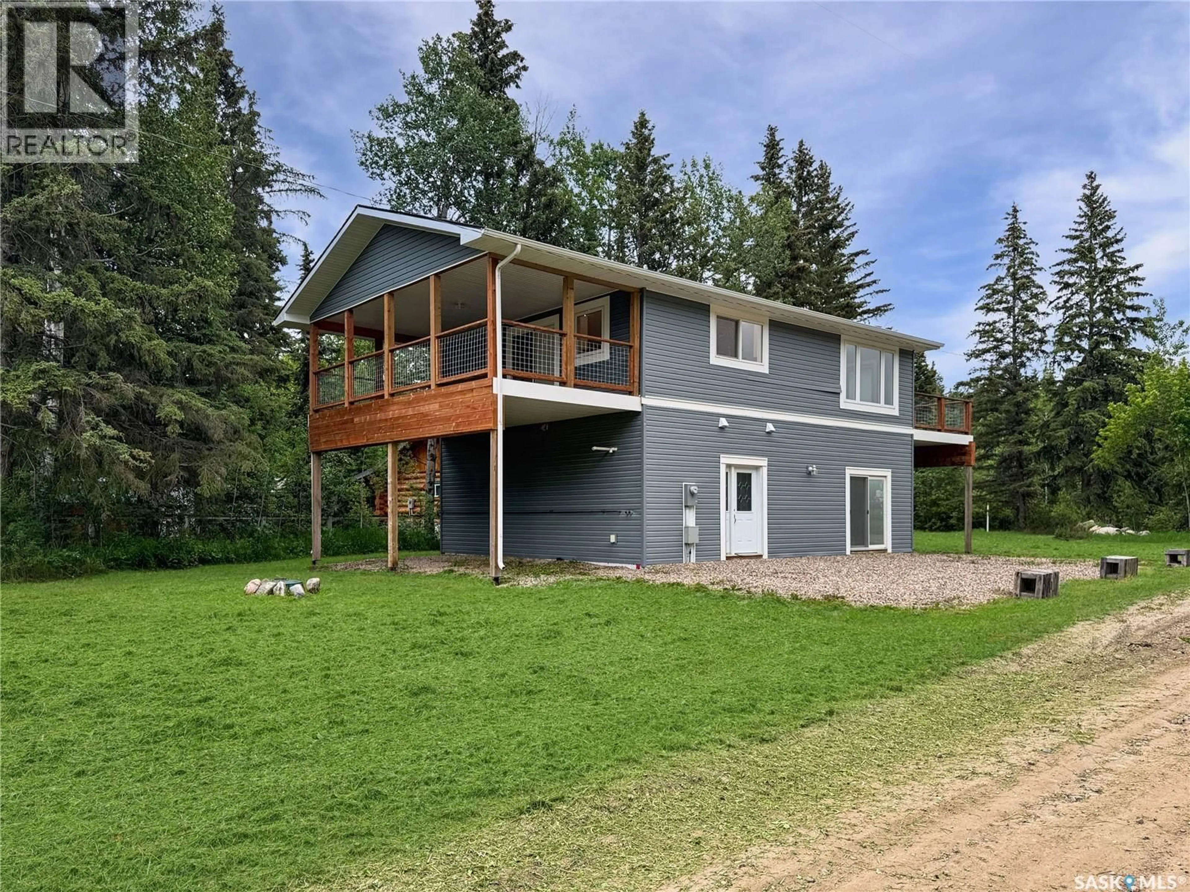 A pic from outside/outdoor area/front of a property/back of a property/a pic from drone, building for 720 RAILWAY STREET, Chitek Lake Saskatchewan S0J0L0