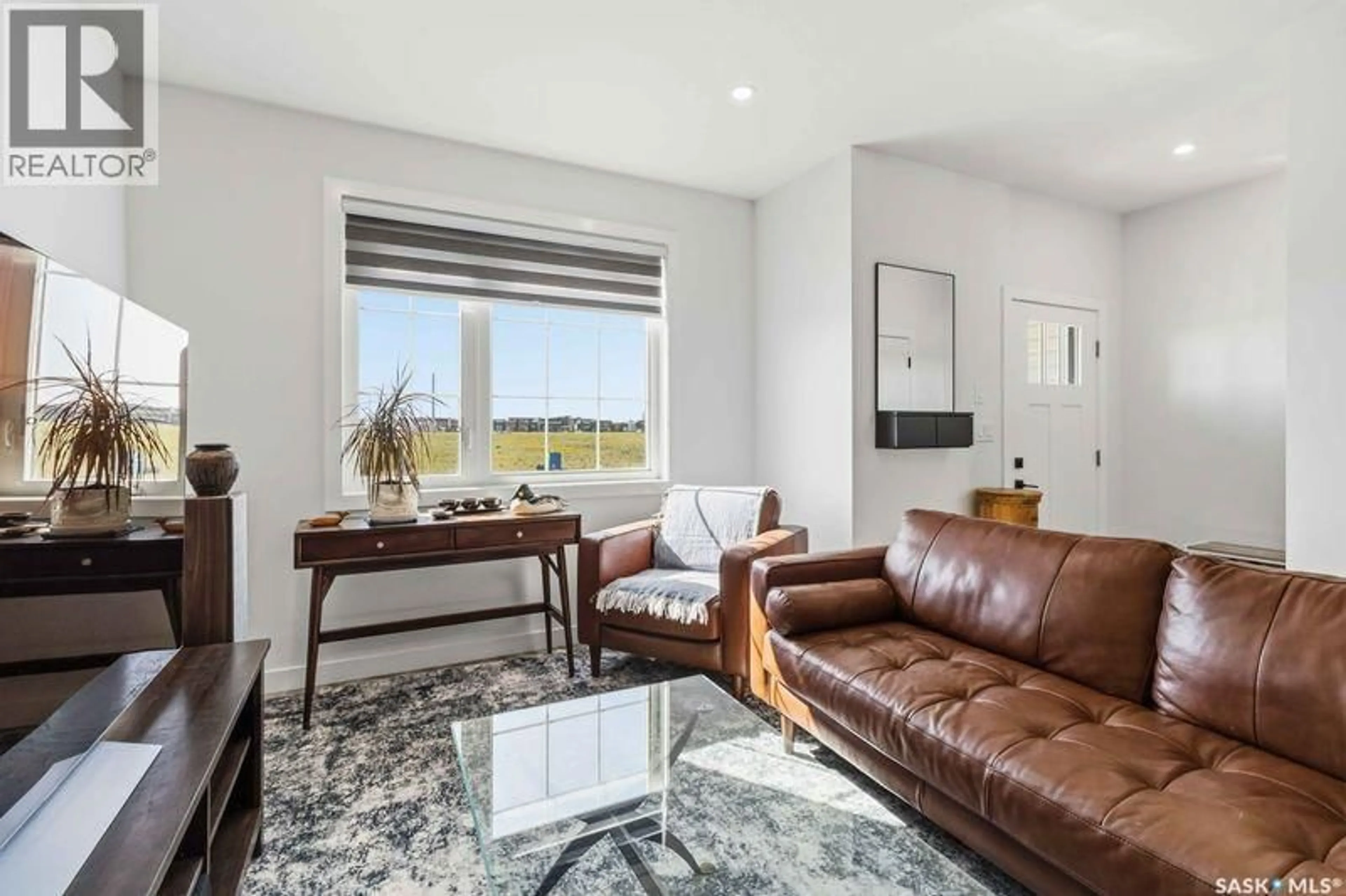 Living room with furniture, unknown for 235 - 205 FEHEREGYHAZI BOULEVARD, Saskatoon Saskatchewan S7W1G8