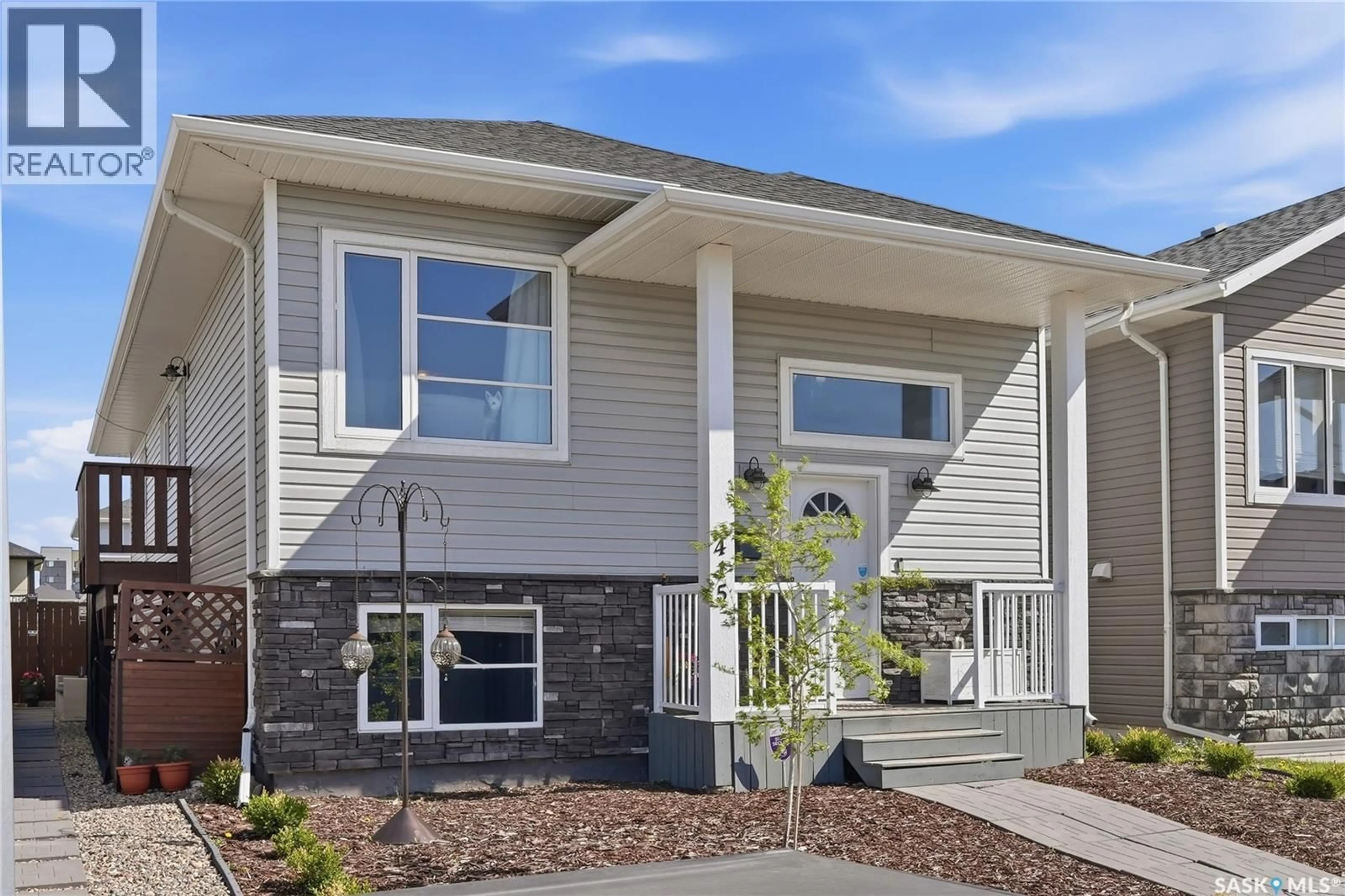 Home with vinyl exterior material, unknown for 415 BOYKOWICH STREET, Saskatoon Saskatchewan S7W0B8