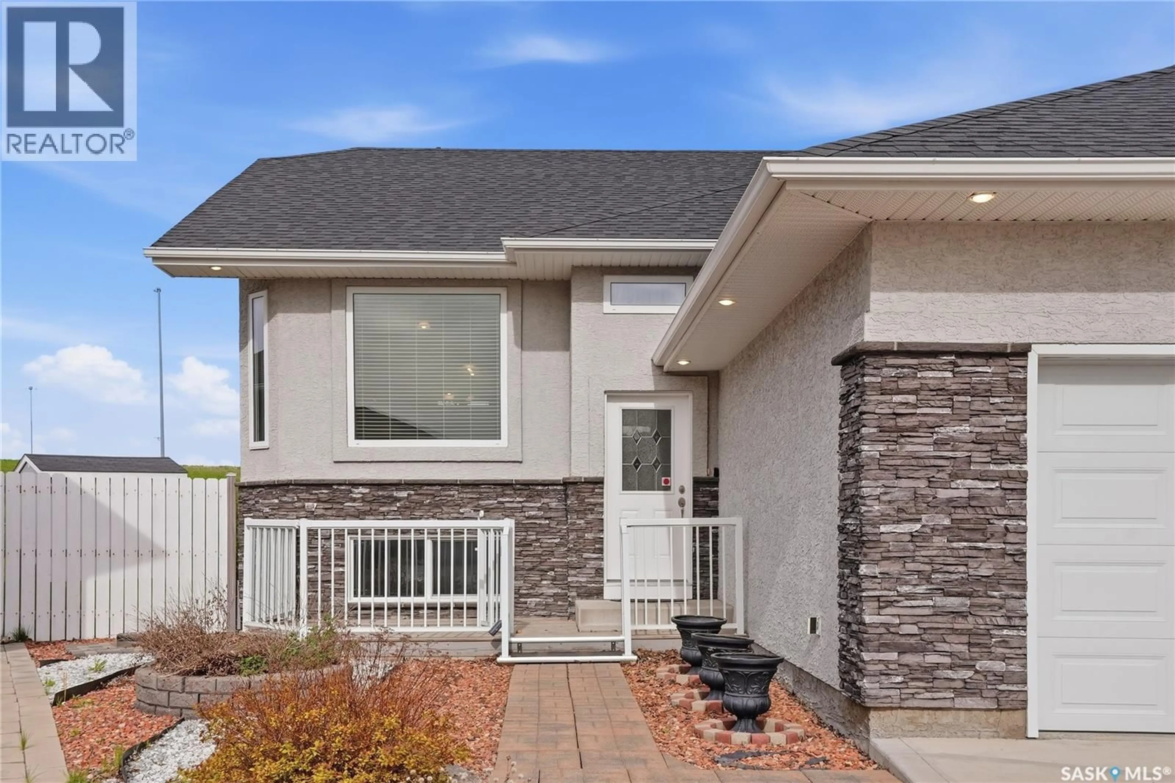 Home with vinyl exterior material, street for 1134 REMPEL PLACE, Saskatoon Saskatchewan S7T0M2