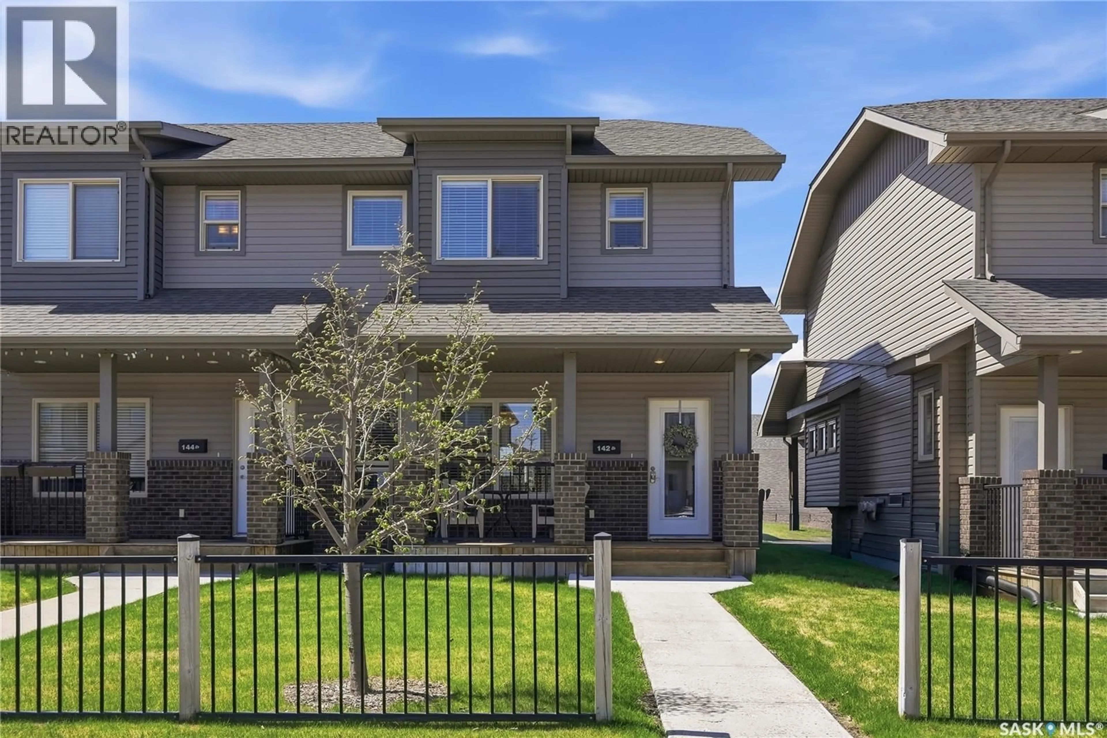 Home with vinyl exterior material, street for N - 142 ROSEWOOD GATE, Saskatoon Saskatchewan S7V0K9