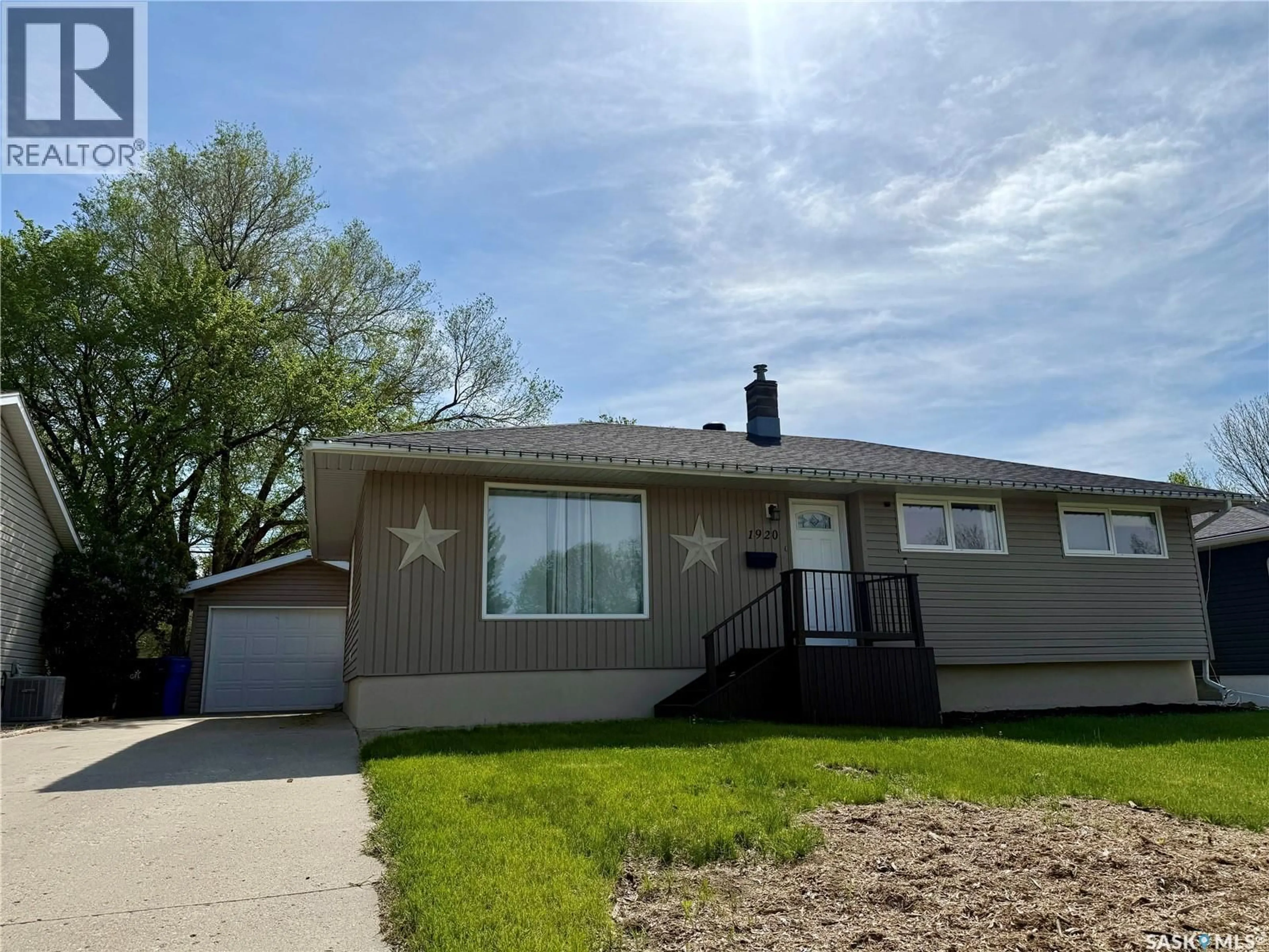 Home with vinyl exterior material, street for 1920 DYER ROAD, Estevan Saskatchewan S4A1Z5