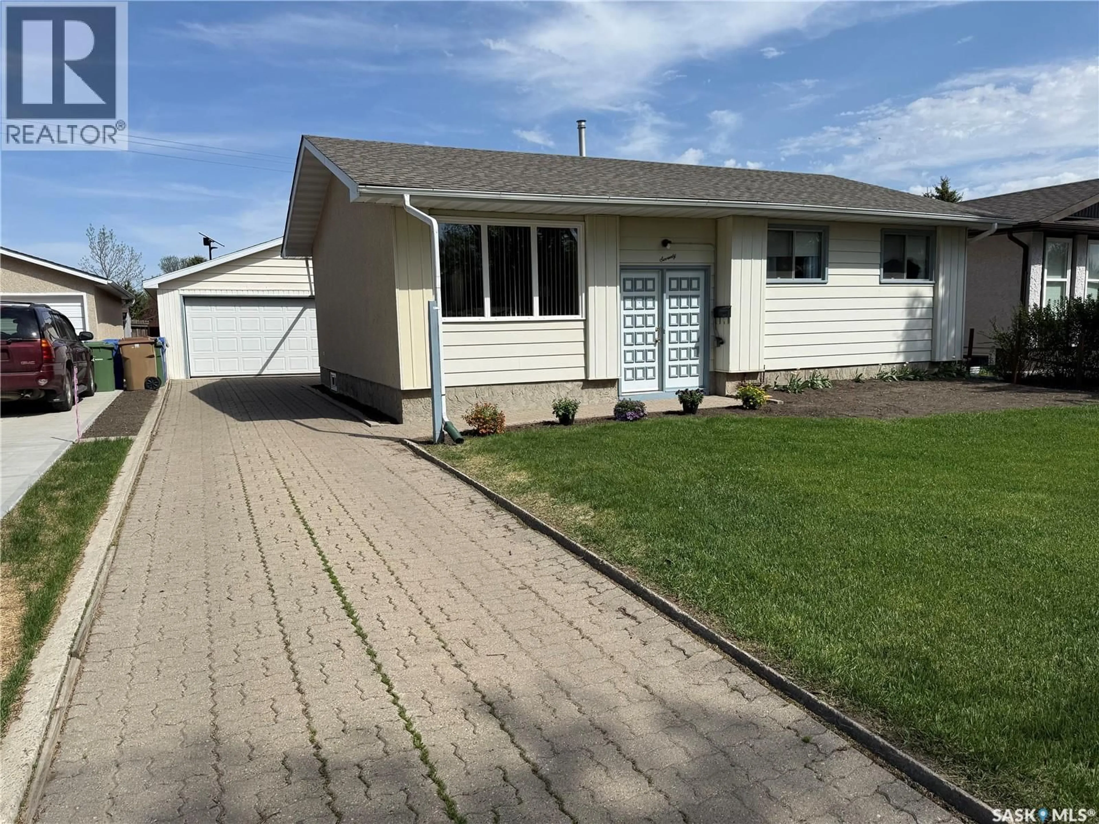 Home with vinyl exterior material, street for 70 HATTON CRESCENT, Regina Saskatchewan S4N5K6