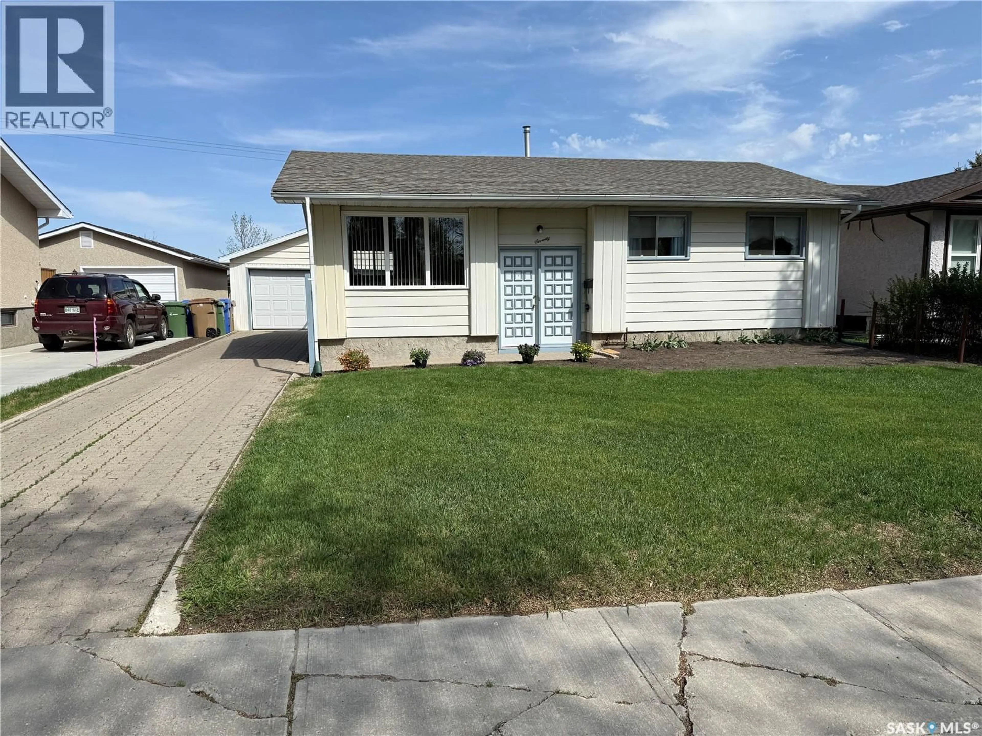 Home with vinyl exterior material, street for 70 HATTON CRESCENT, Regina Saskatchewan S4N5K6