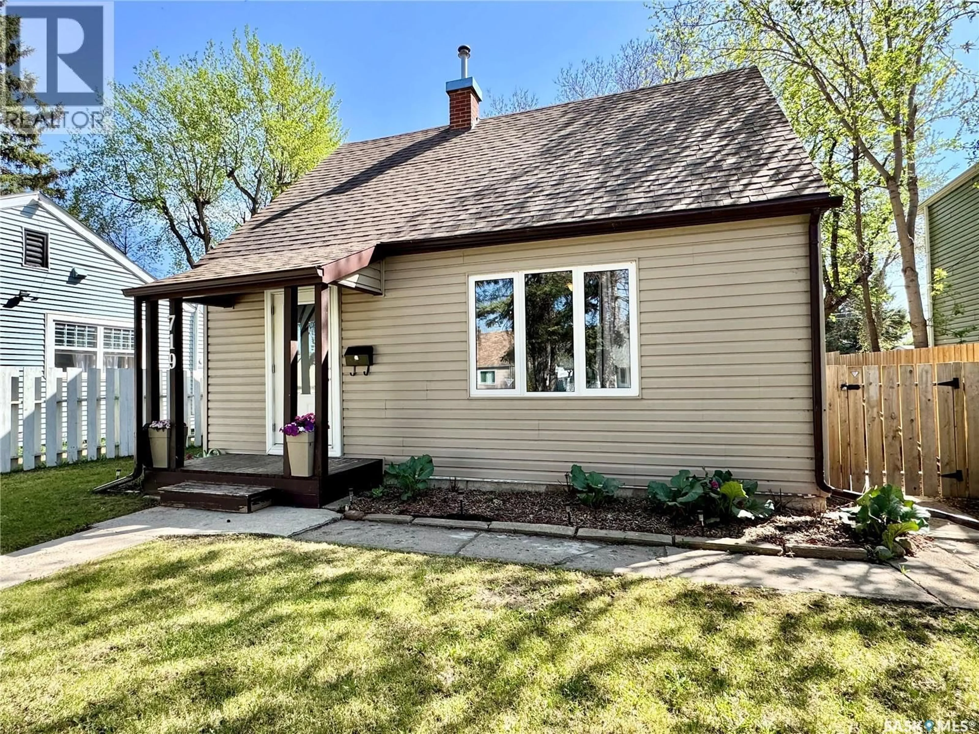 Home with vinyl exterior material, street for 719 4TH STREET, Prince Albert Saskatchewan S6V0K4