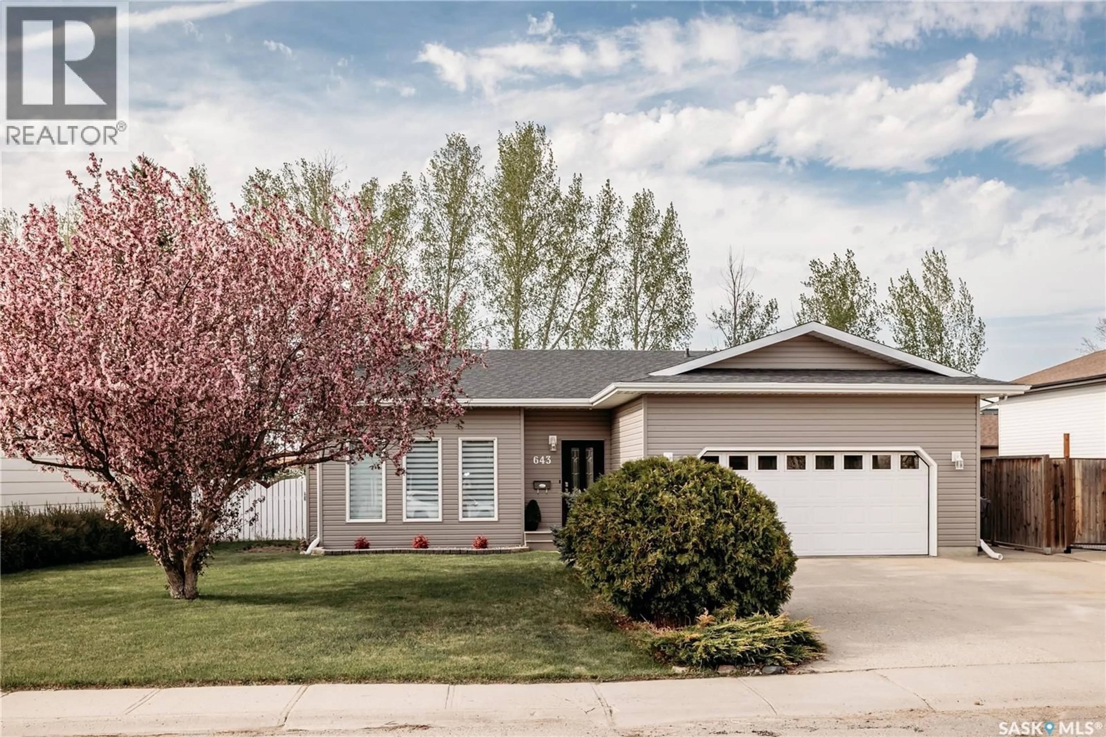 Home with vinyl exterior material, street for 643 DIEPPE DRIVE, Weyburn Saskatchewan S4H3G4