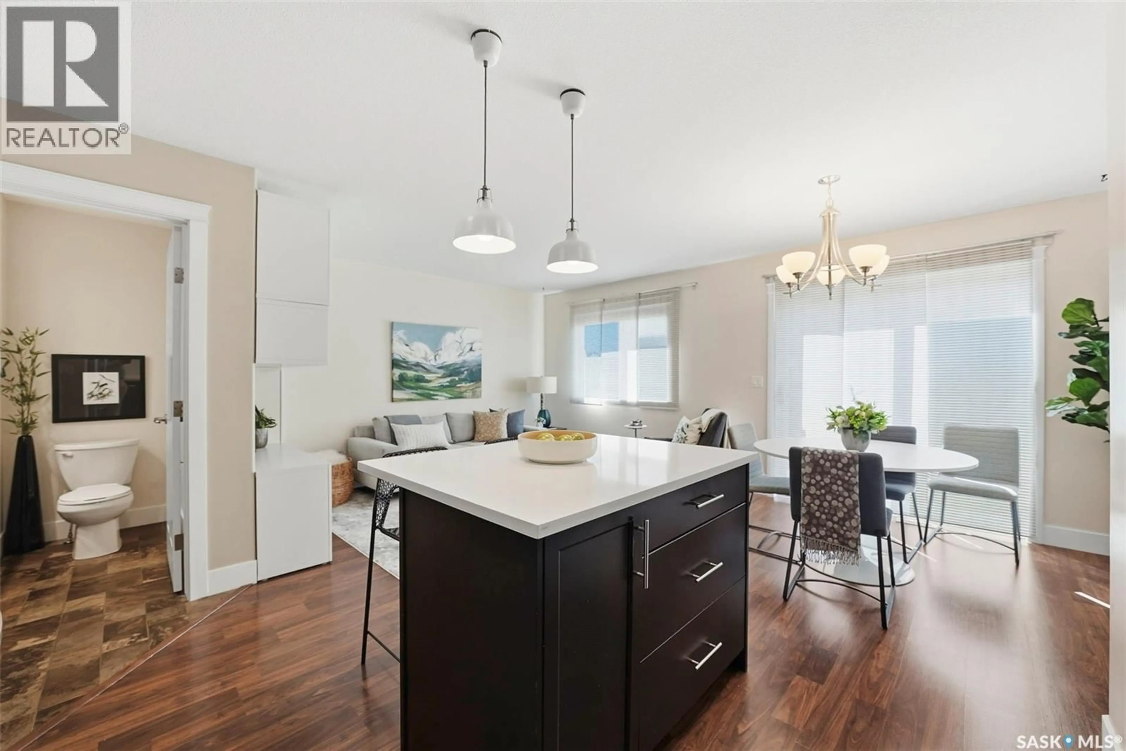 Open concept kitchen, wood/laminate floor for S - 130 901 4TH STREET, Martensville Saskatchewan S0K2T1