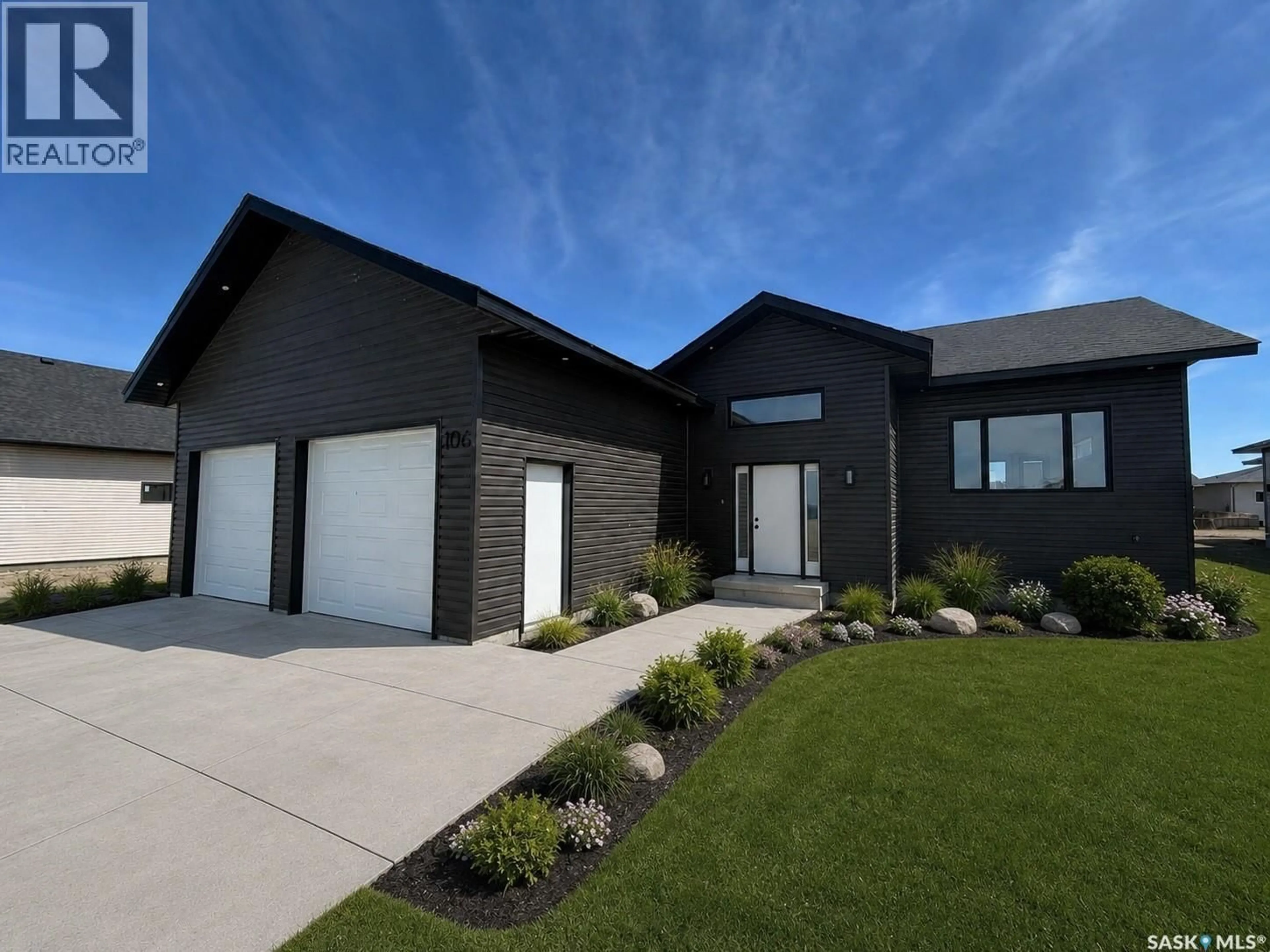 Home with brick exterior material, street for 106 LAKEWOOD DRIVE, Humboldt Saskatchewan S0K2A0