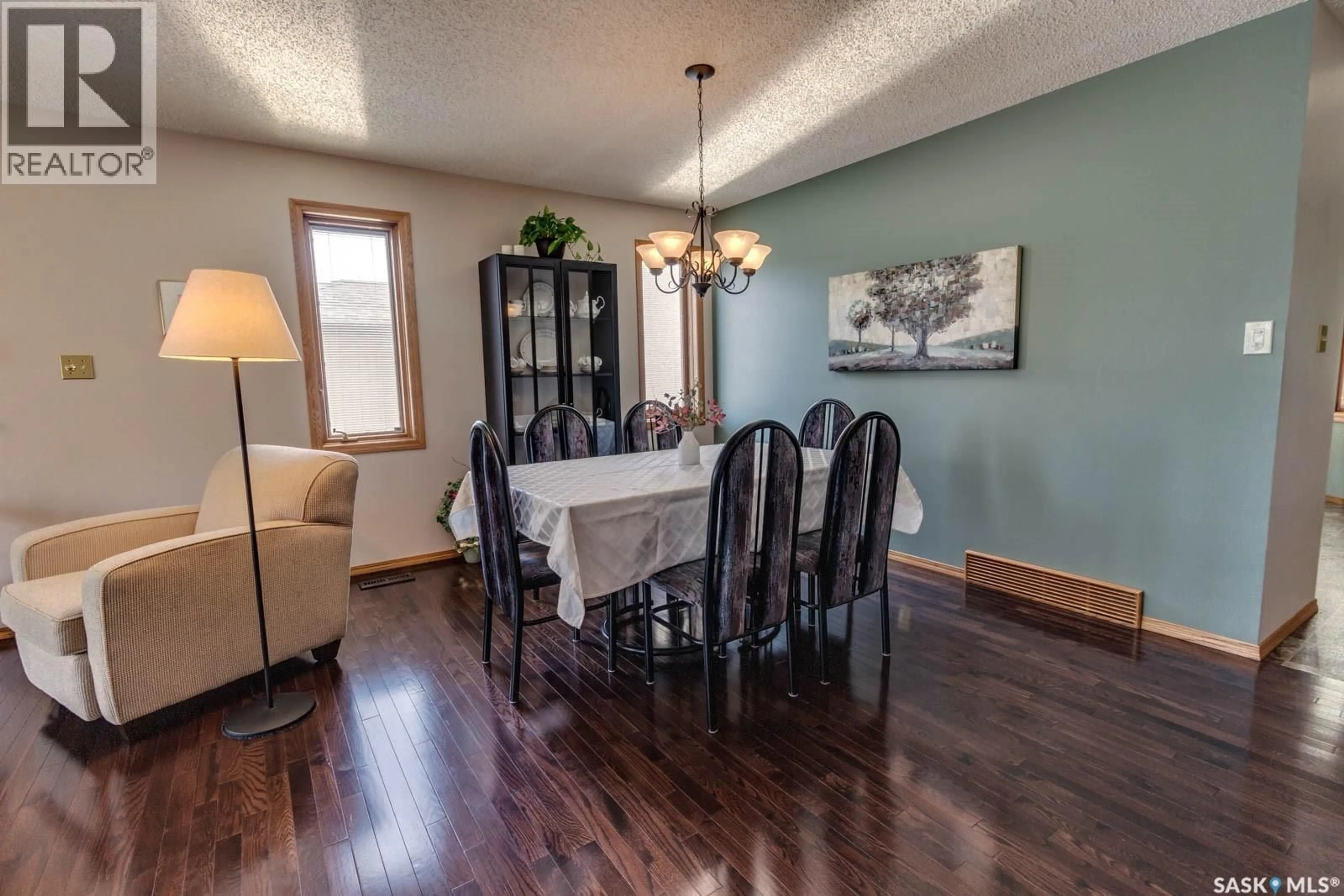 Dining room, wood/laminate floor for 205 HECTOR CRESCENT, Regina Saskatchewan S4Y1C1