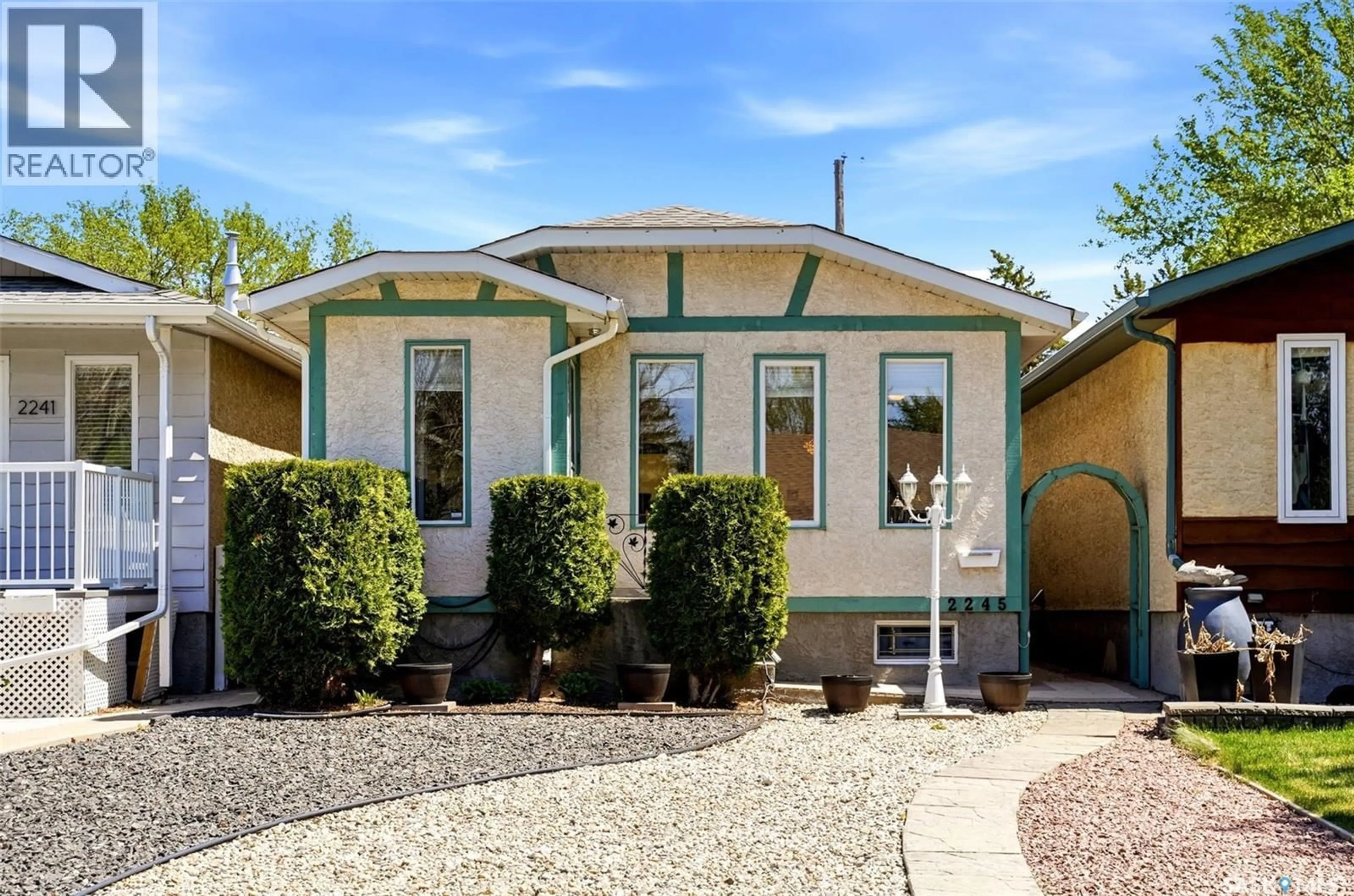 Home with vinyl exterior material, street for 2245 REYNOLDS STREET, Regina Saskatchewan S4V3N4