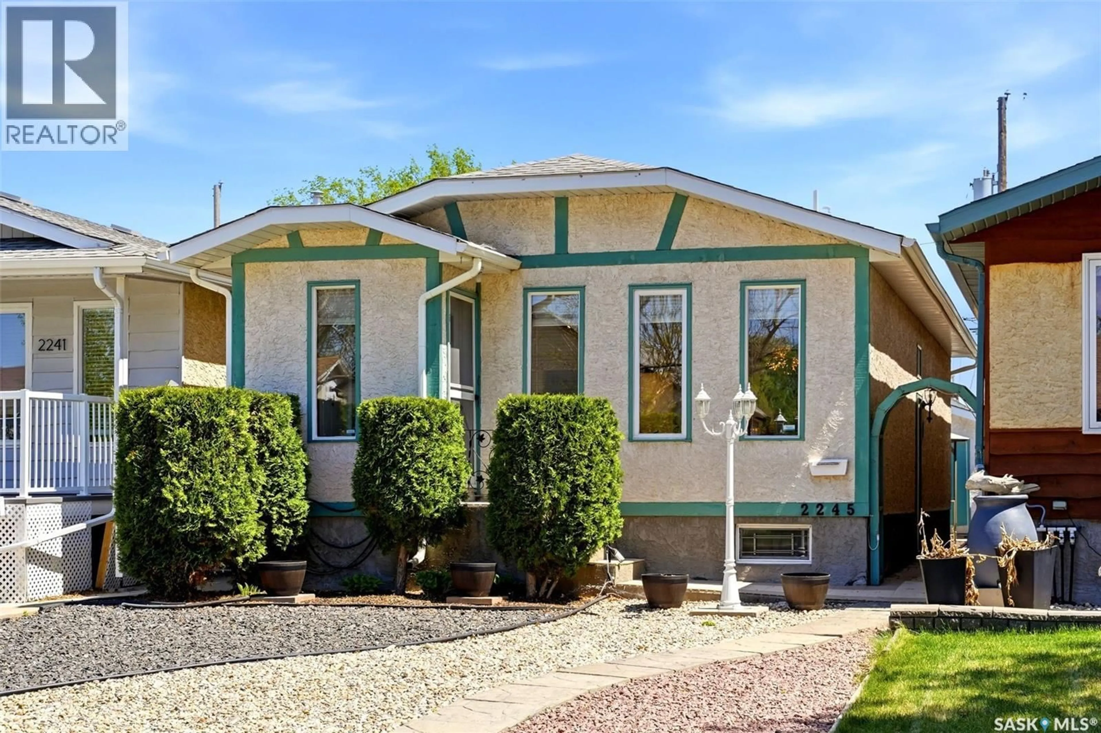 Home with vinyl exterior material, street for 2245 REYNOLDS STREET, Regina Saskatchewan S4V3N4