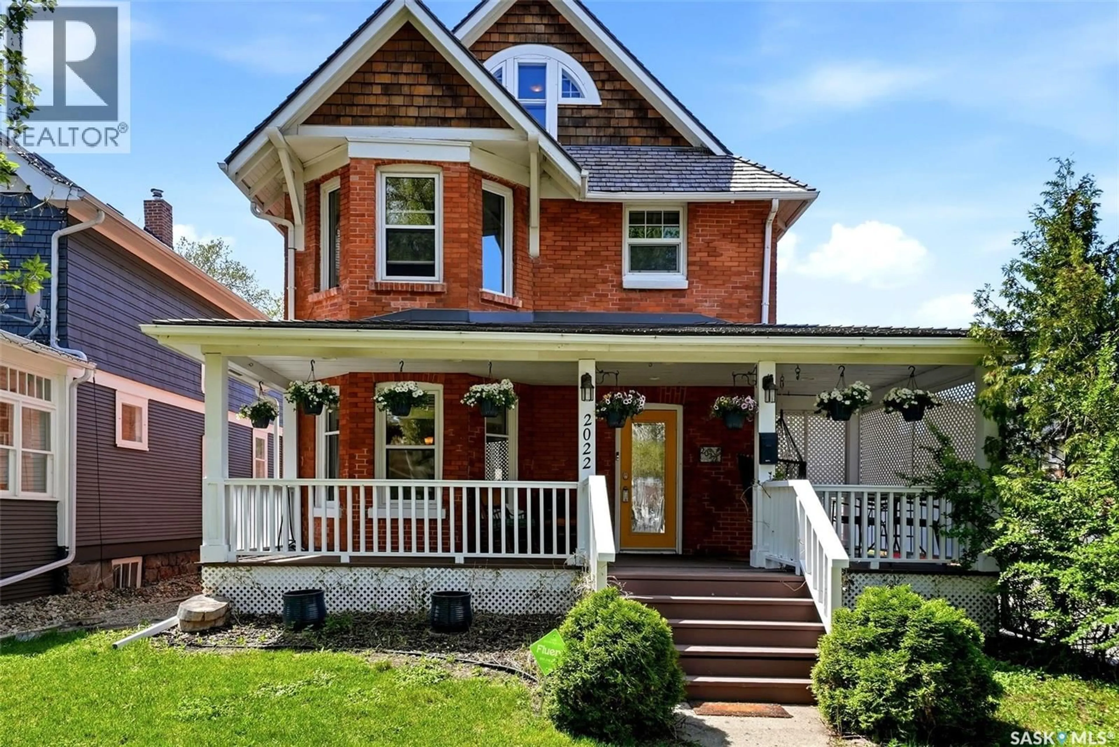 Home with brick exterior material, street for 2022 RETALLACK STREET, Regina Saskatchewan S4T2K2