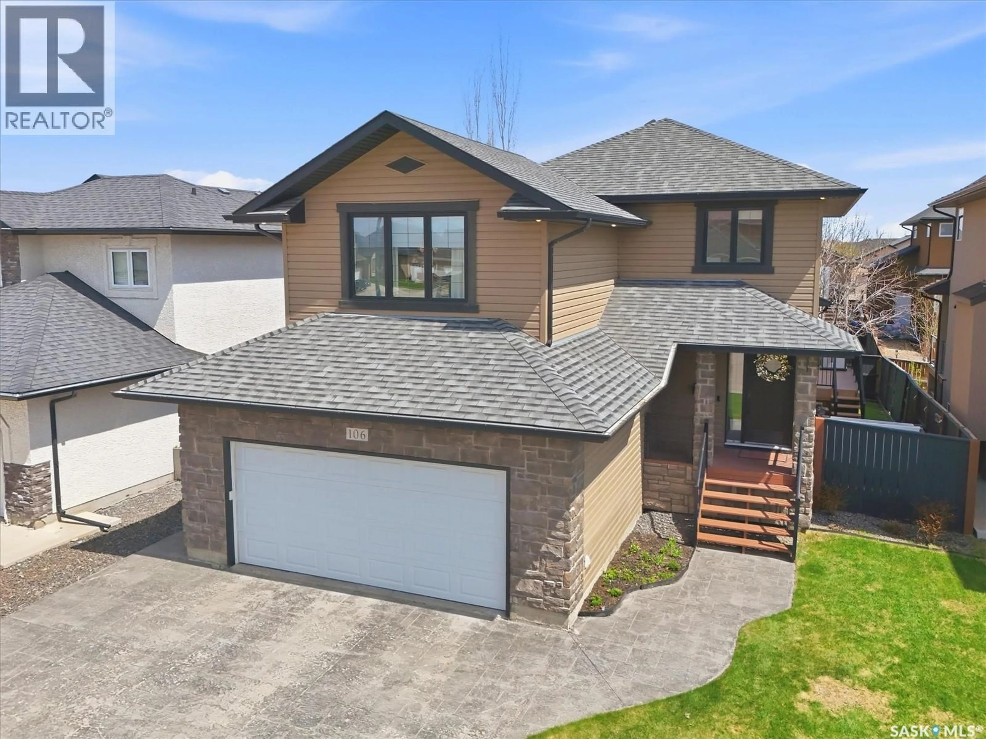 A pic from outside/outdoor area/front of a property/back of a property/a pic from drone, street for 106 WILKINS CRESCENT, Saskatoon Saskatchewan S7W0C5