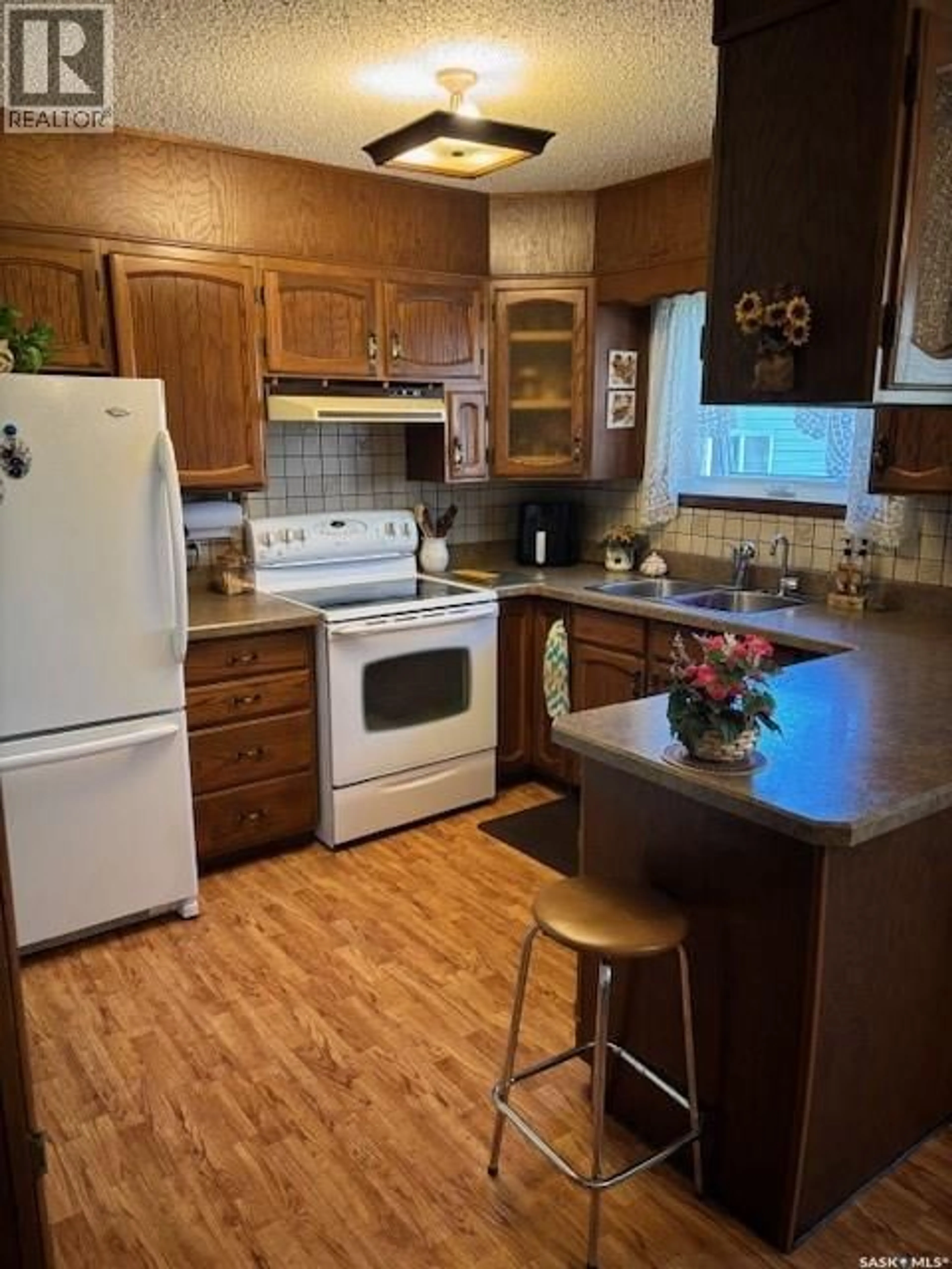 Standard kitchen, wood/laminate floor for 149 GARVIN CRESCENT, Canora Saskatchewan S0A0L0