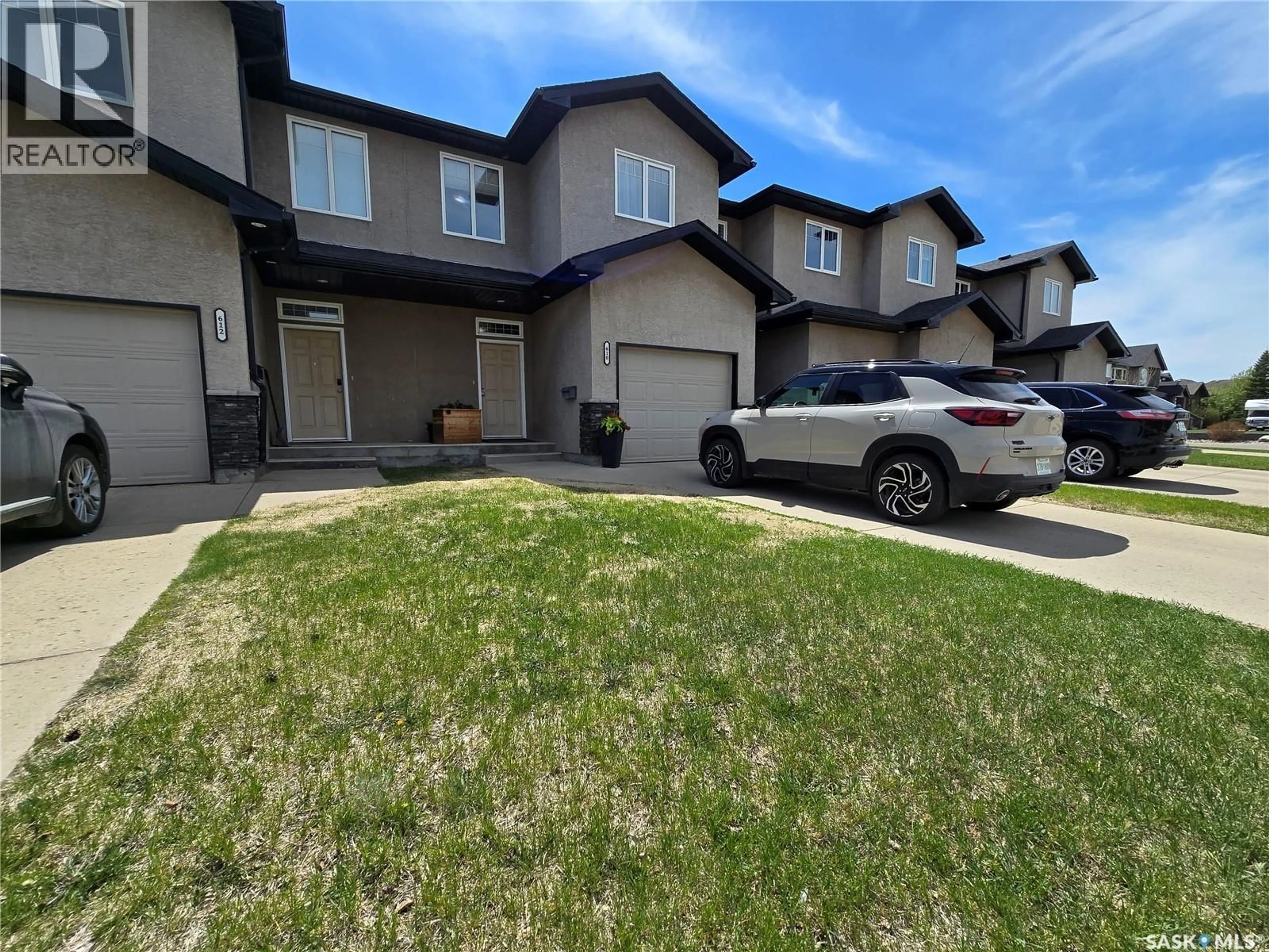 A pic from outside/outdoor area/front of a property/back of a property/a pic from drone, street for 610 BARBER CRESCENT, Weyburn Saskatchewan S4H0M9