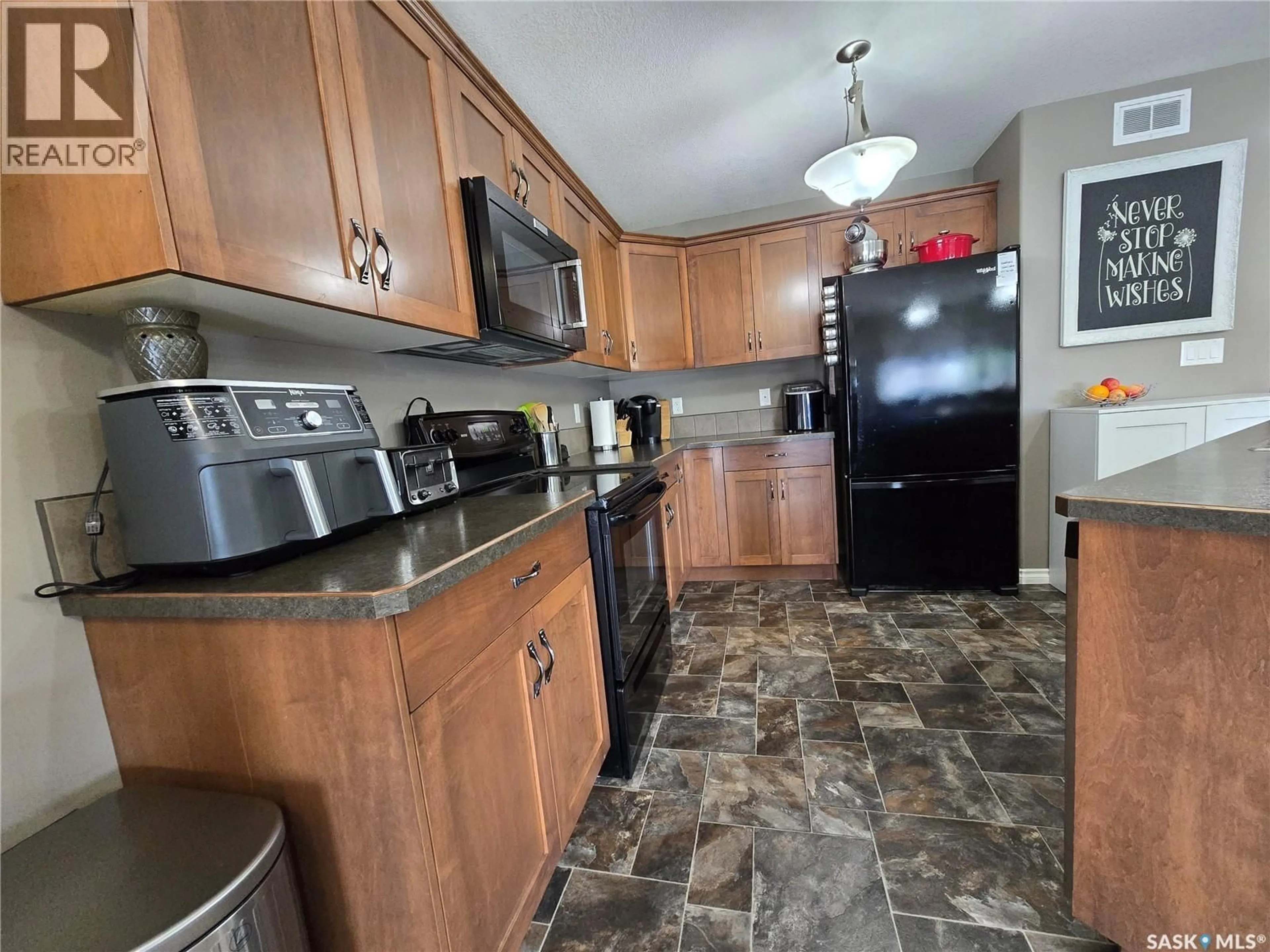 Standard kitchen, ceramic/tile floor for 610 BARBER CRESCENT, Weyburn Saskatchewan S4H0M9