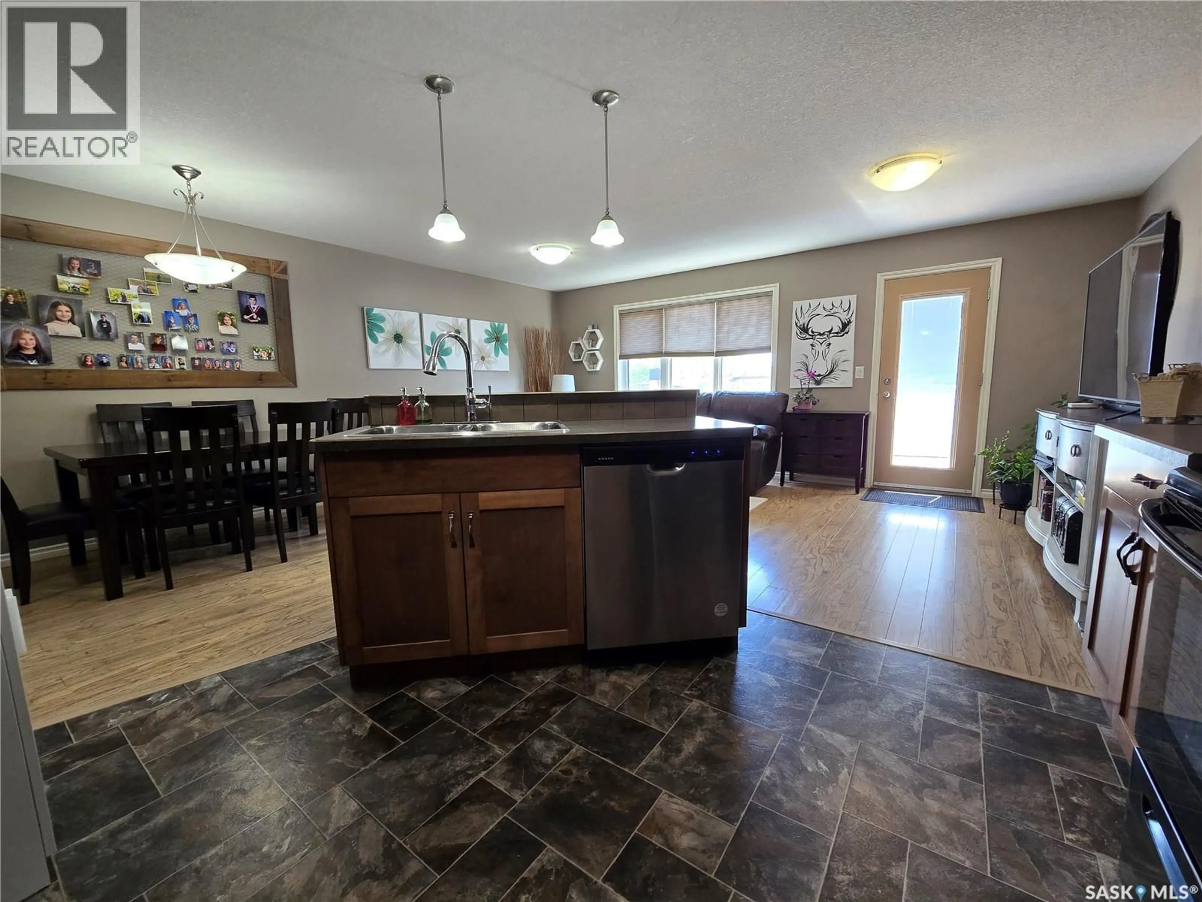 Open concept kitchen, ceramic/tile floor for 610 BARBER CRESCENT, Weyburn Saskatchewan S4H0M9