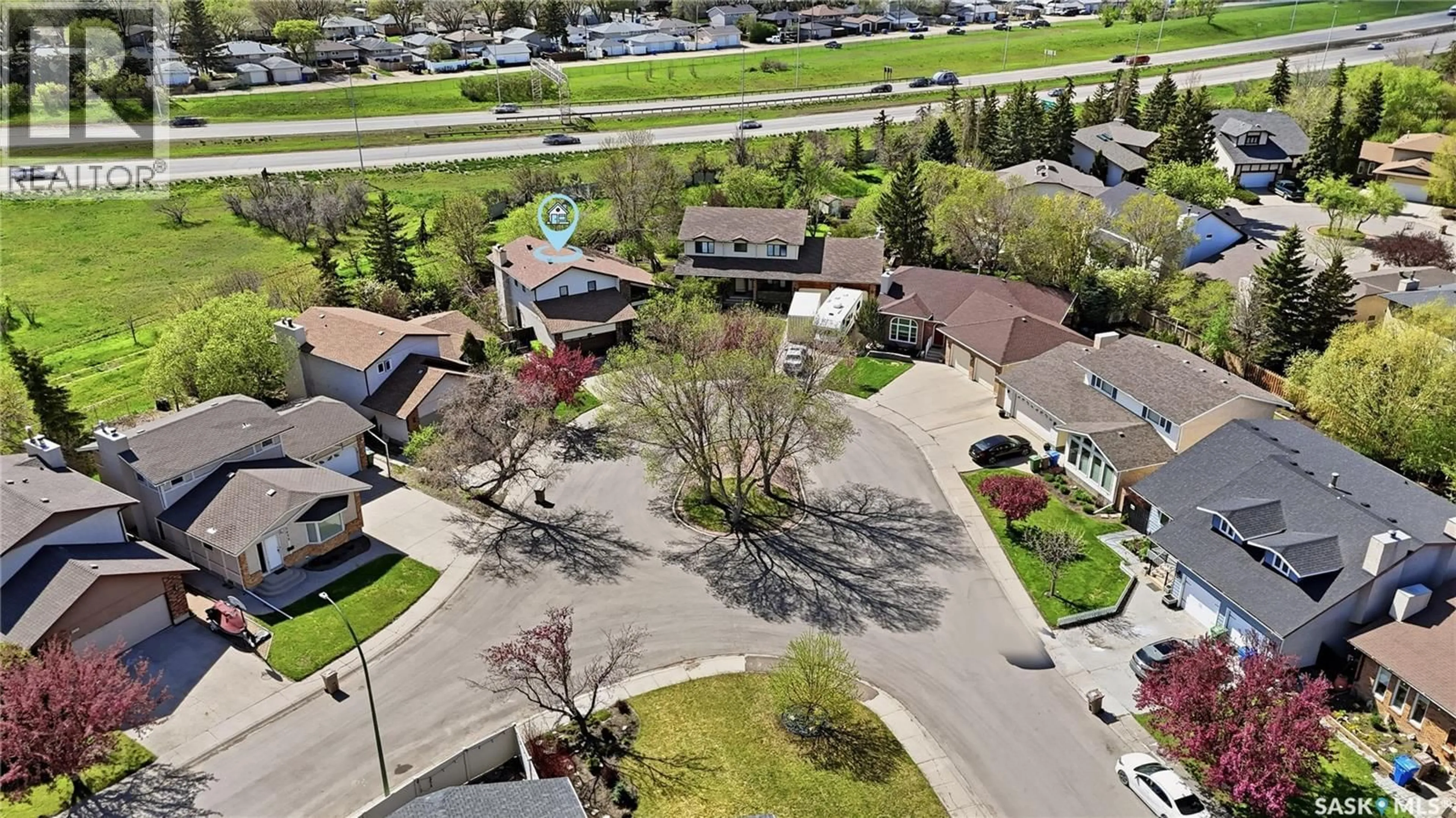 A pic from outside/outdoor area/front of a property/back of a property/a pic from drone, street for 2447 SWAYZE CRESCENT, Regina Saskatchewan S4V1A4