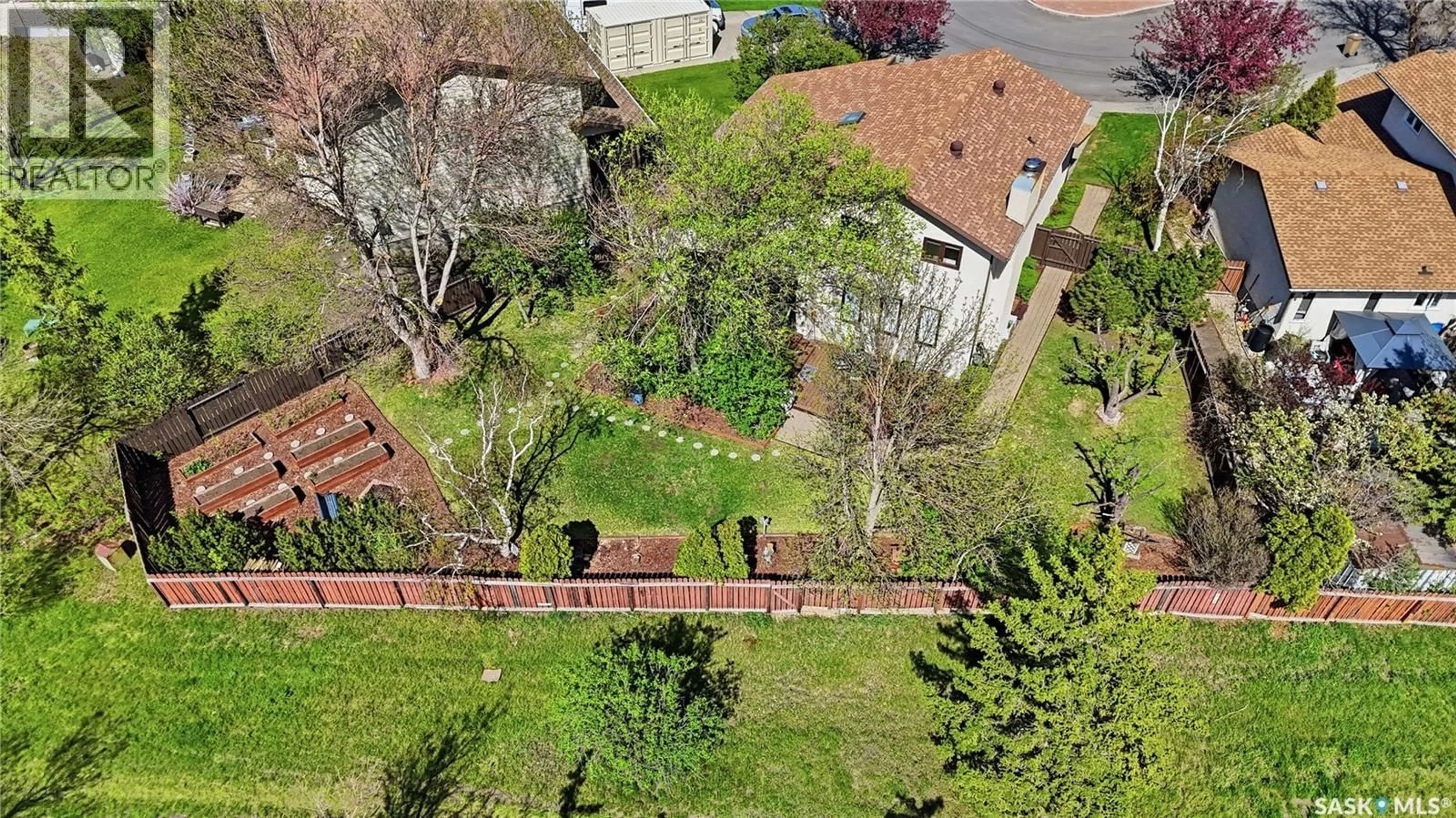 A pic from outside/outdoor area/front of a property/back of a property/a pic from drone, street for 2447 SWAYZE CRESCENT, Regina Saskatchewan S4V1A4