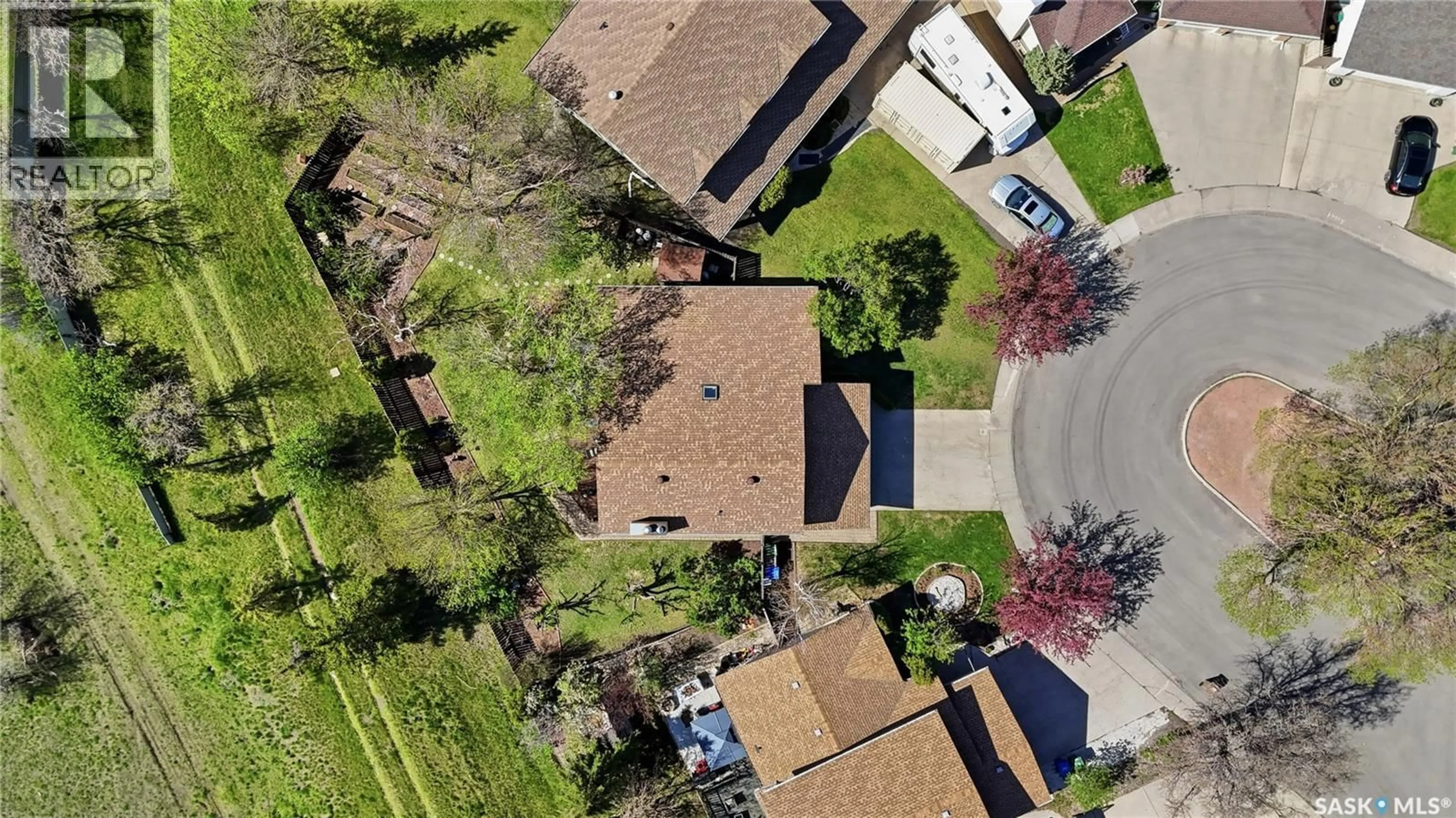 A pic from outside/outdoor area/front of a property/back of a property/a pic from drone, street for 2447 SWAYZE CRESCENT, Regina Saskatchewan S4V1A4